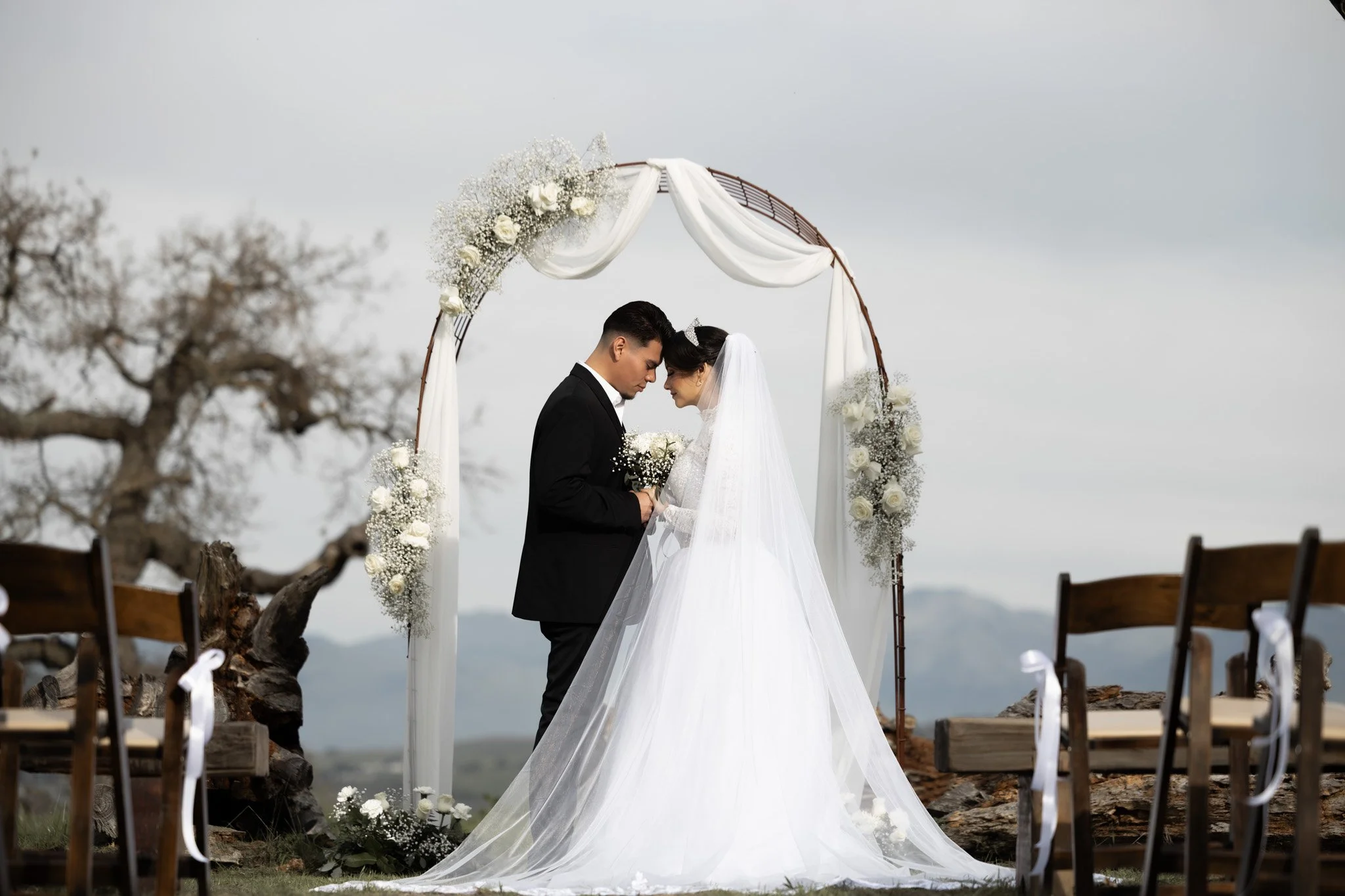 aldo couple arch field ceremony high res.jpg