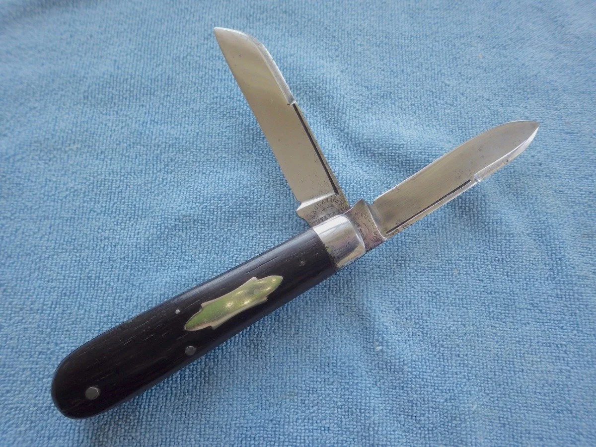 An antique pocketknife manufactured by the Naugatuck Cutlery Company in Naugatuck, CT. The stamp is still clearly visible on the tang.