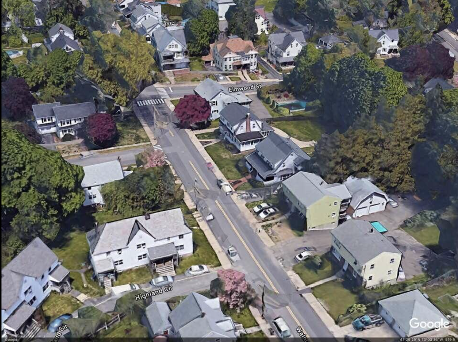 The Hamilton house location today. Home located where the two newer houses are in lower right. The house in the postcard background is the 3rd house on Elmwood Street.