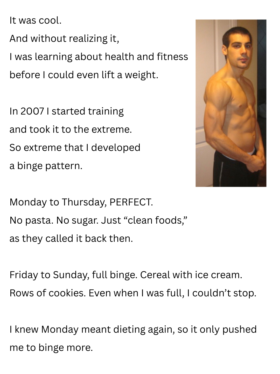 A man with short dark hair and a trimmed beard, standing shirtless beside a door in a home setting, flexing his muscles and looking at the camera.