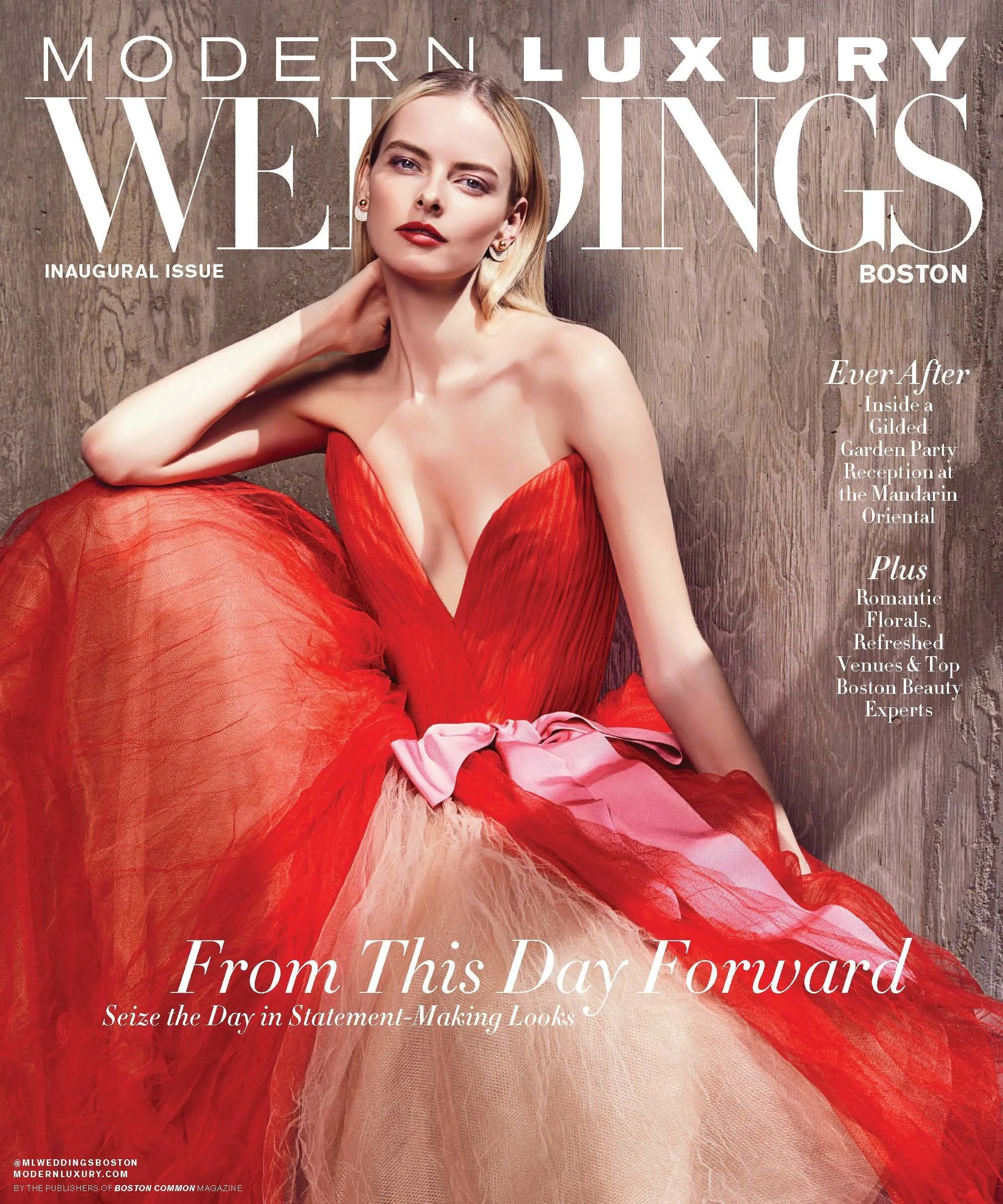 Cover of Modern Luxury Weddings magazine featuring a blonde woman in a red strapless gown with tulle skirt, sitting against a wooden background.