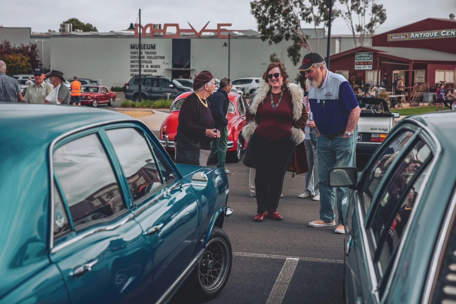 Car club members with classic cars at MOVE