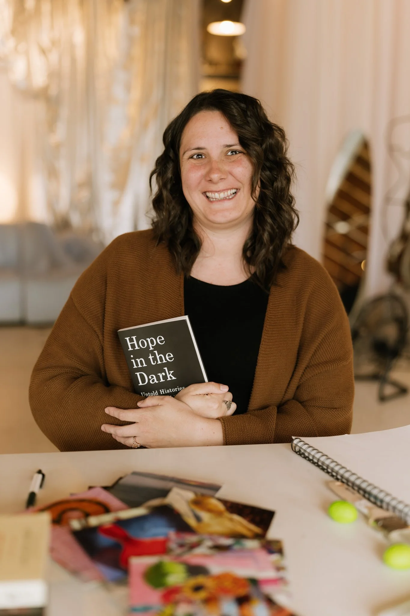 Therapist holding an inspirational book