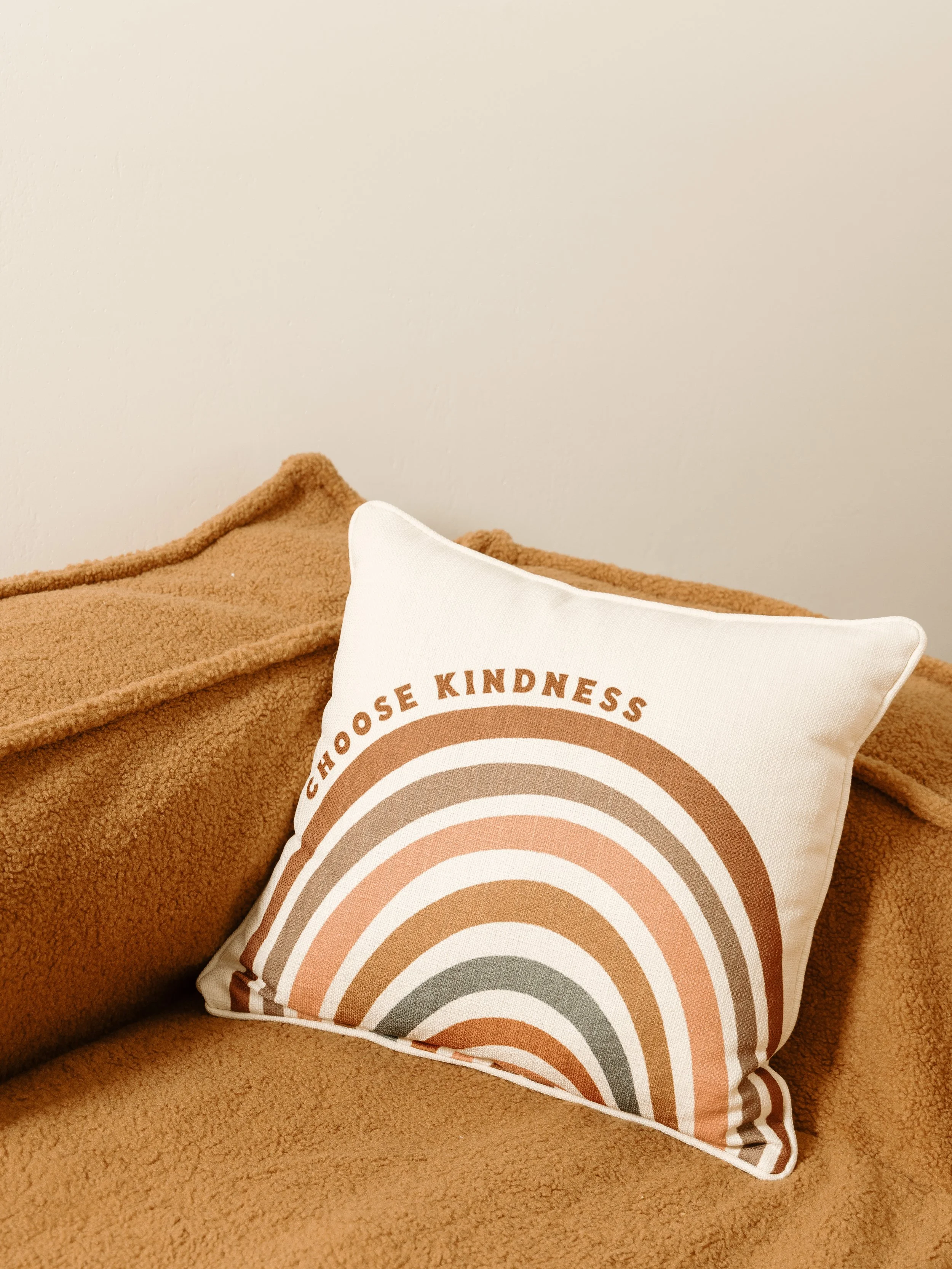 Pillow with the words "choose kindness" on it