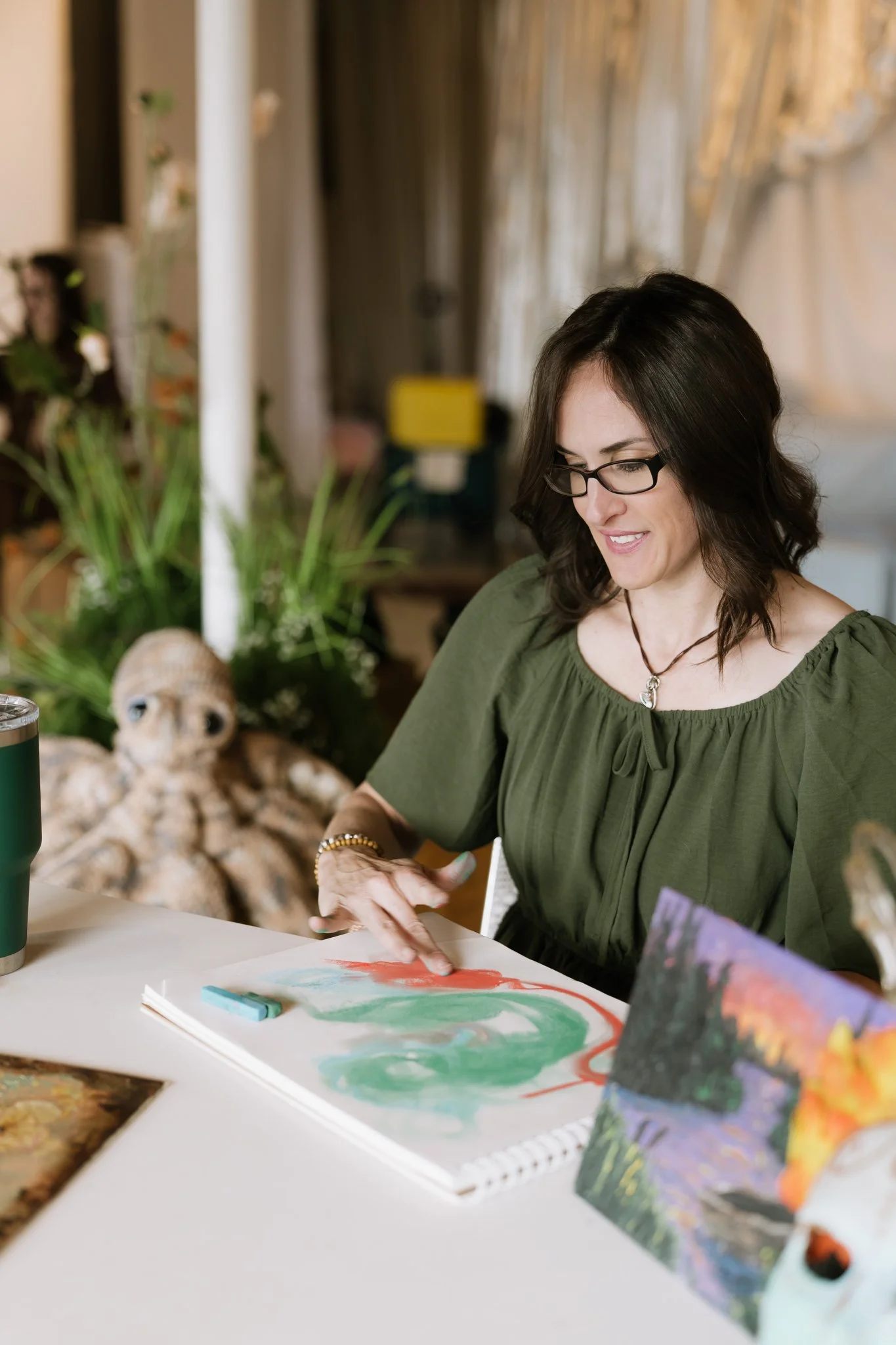 Person painting with their fingers