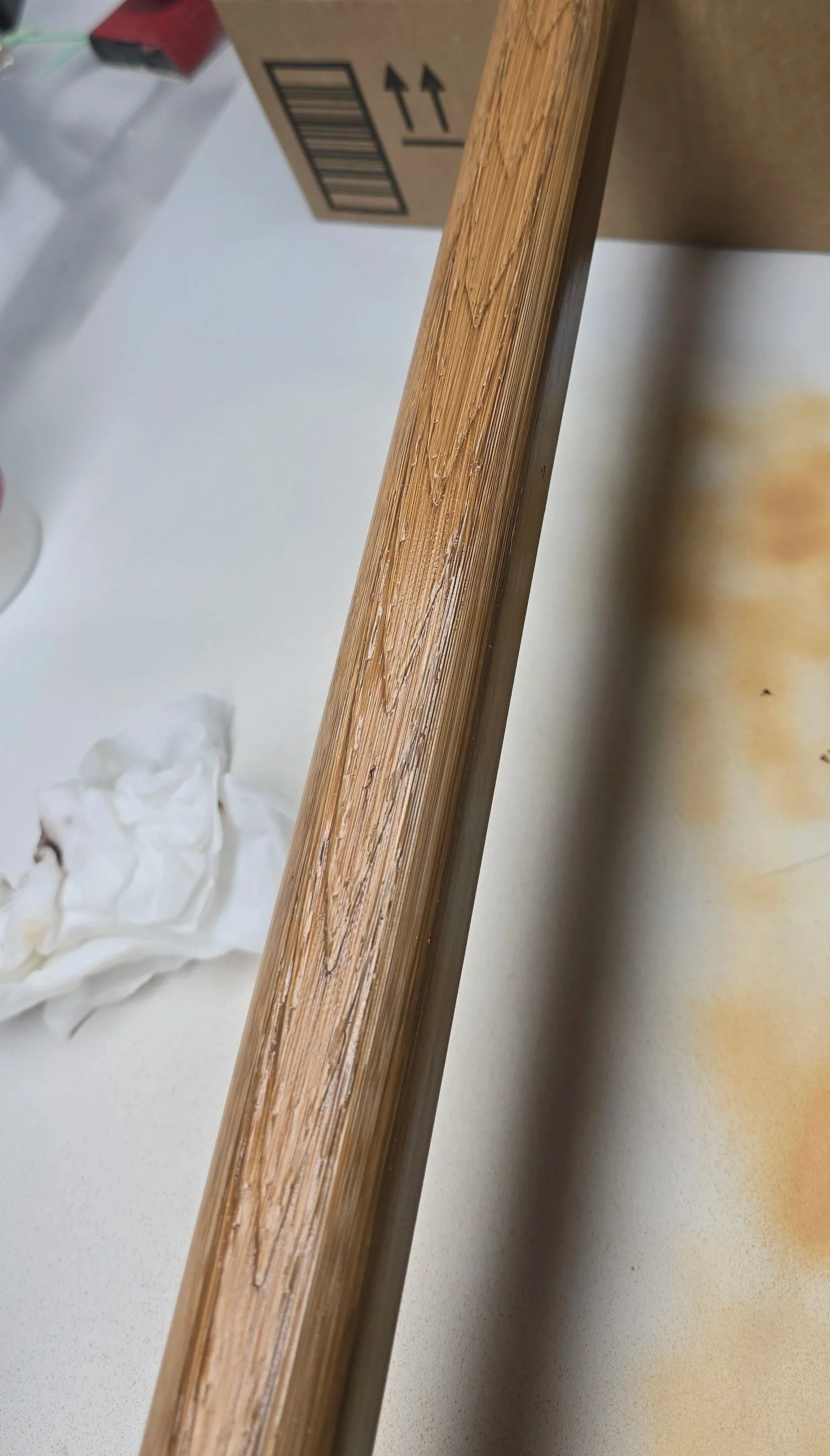 Brown color applied with sponge to give wood like appearance.