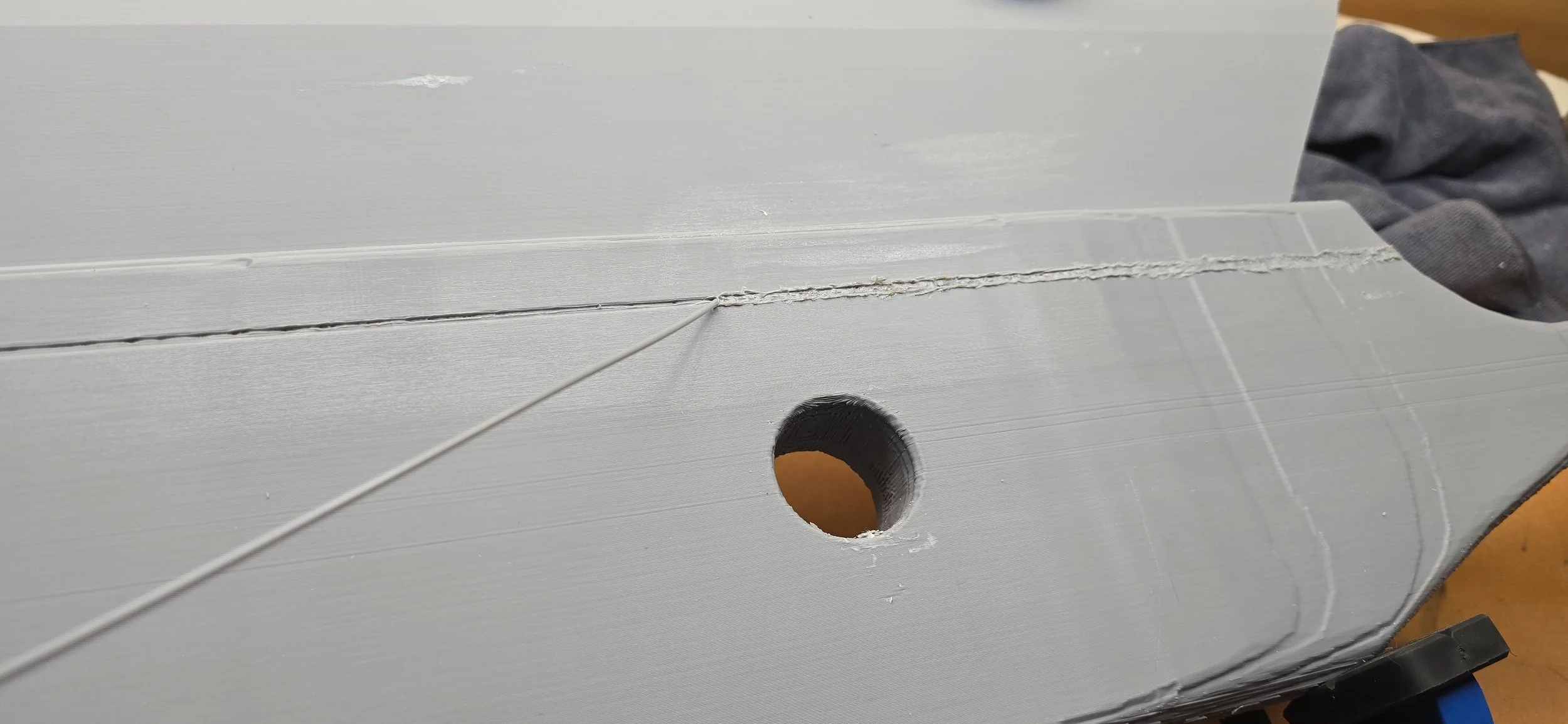 Welding the two halves together with a soldering iron