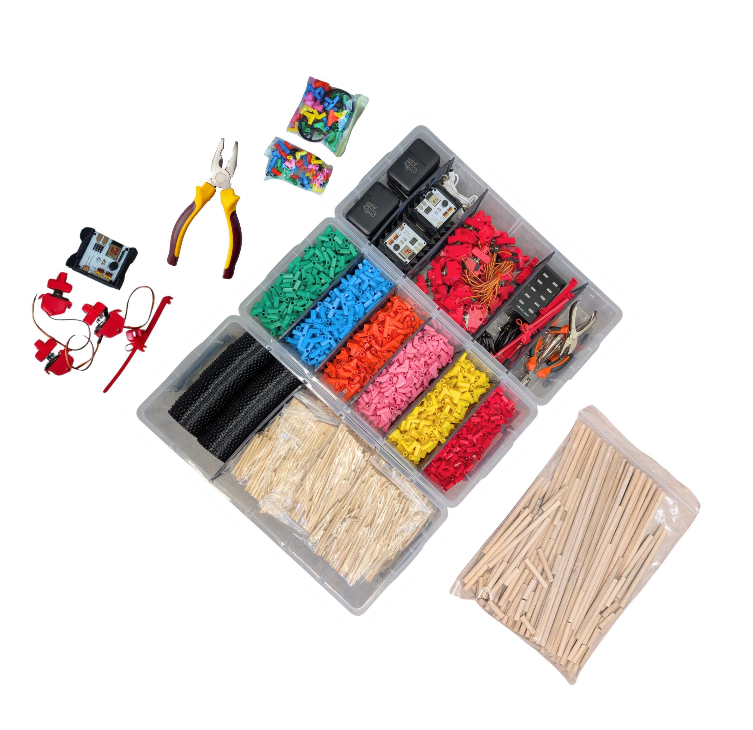 Plastic organizer box filled with different colors of small plastic parts and a small electronic component, with a pair of wire cutters nearby.