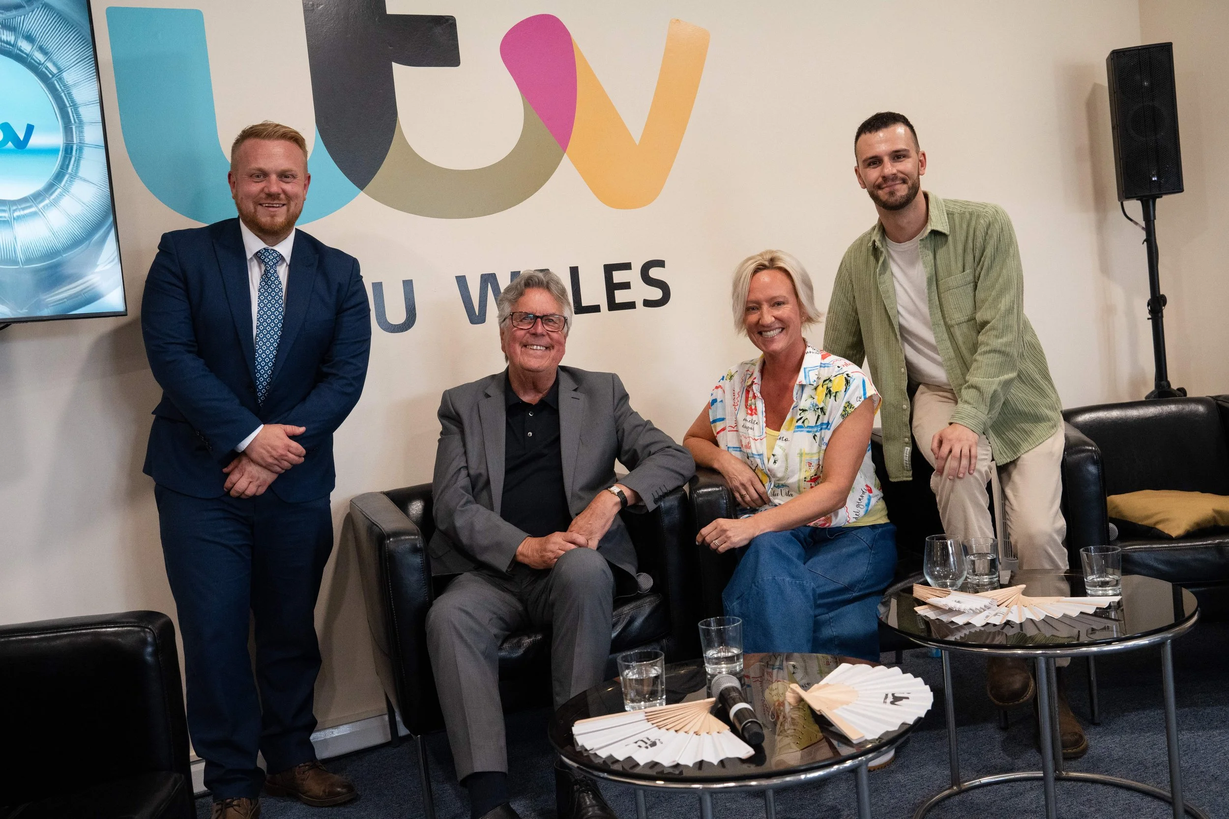 Rob Osborne with colleagues at a media event, representing ITV in a professional panel and networking setting
