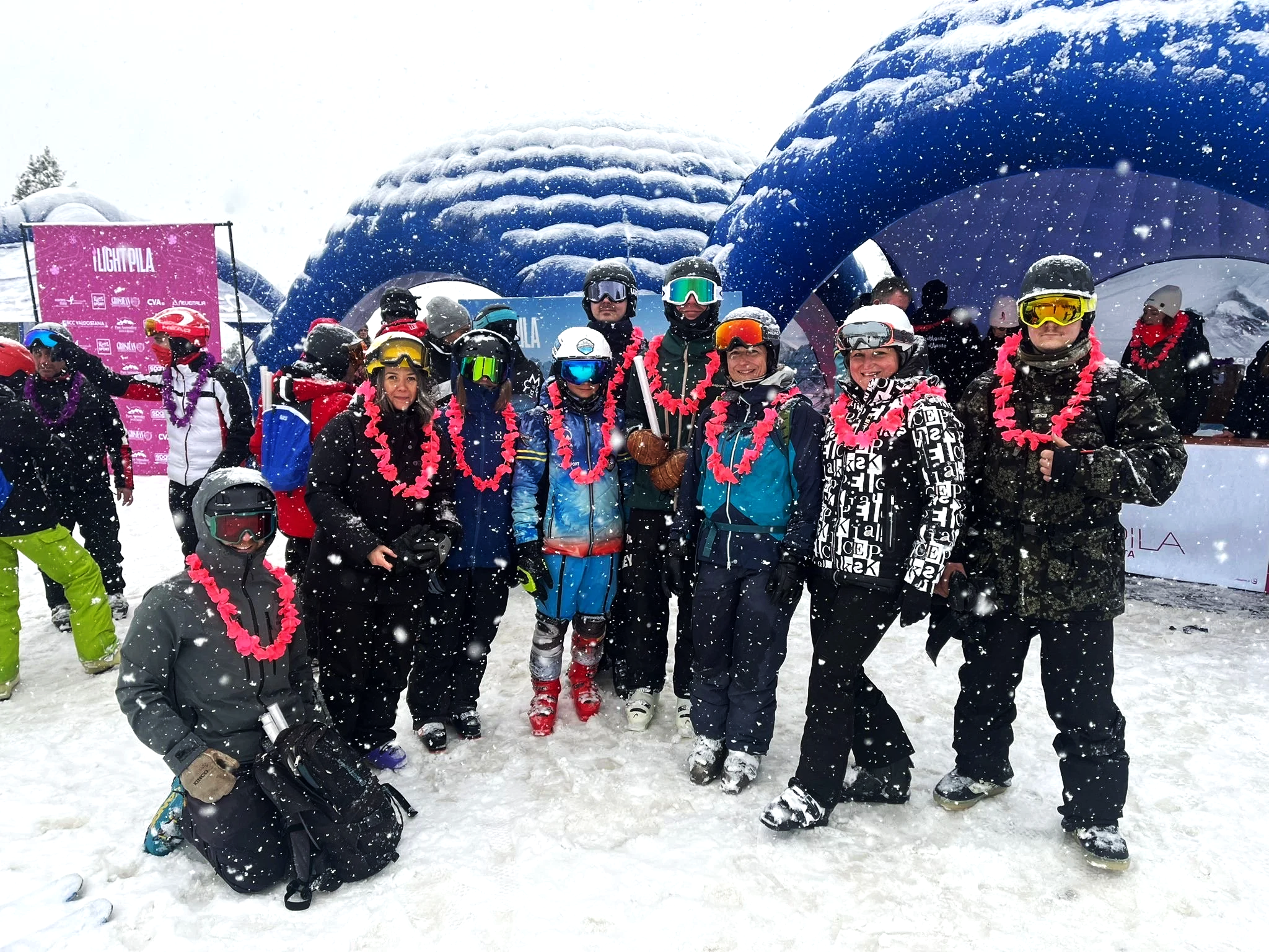 people in the snow waiting for going skiing