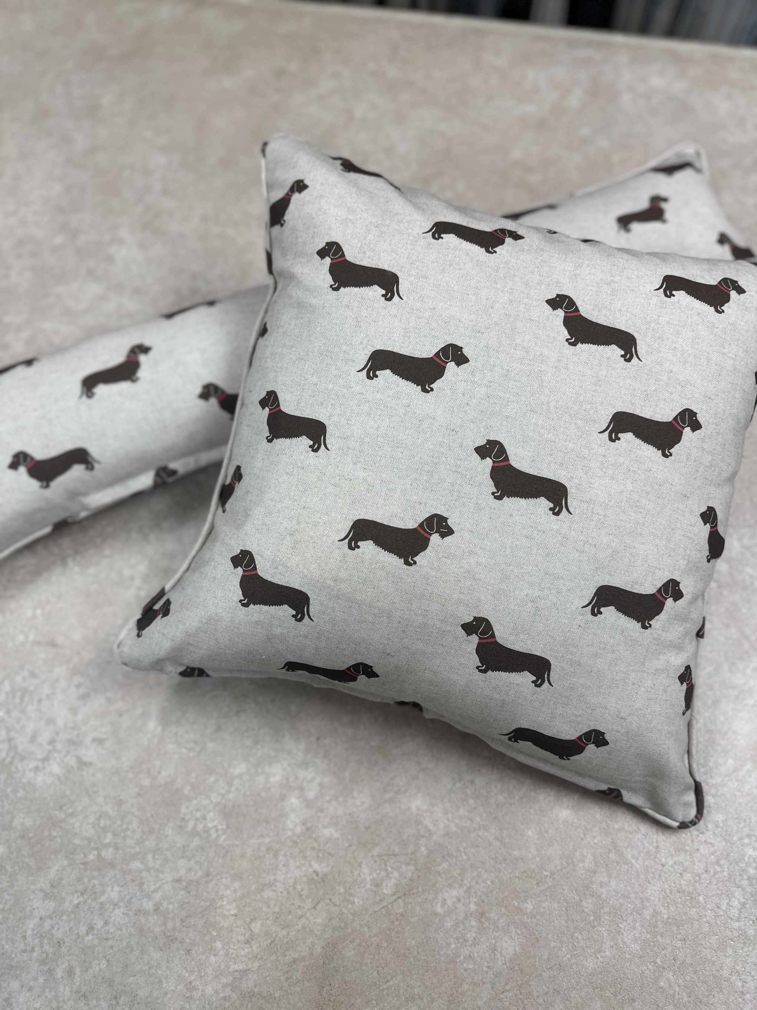 Bespoke cushion and draft excluder. Fabric: Ashley Wilde by Emily Bond