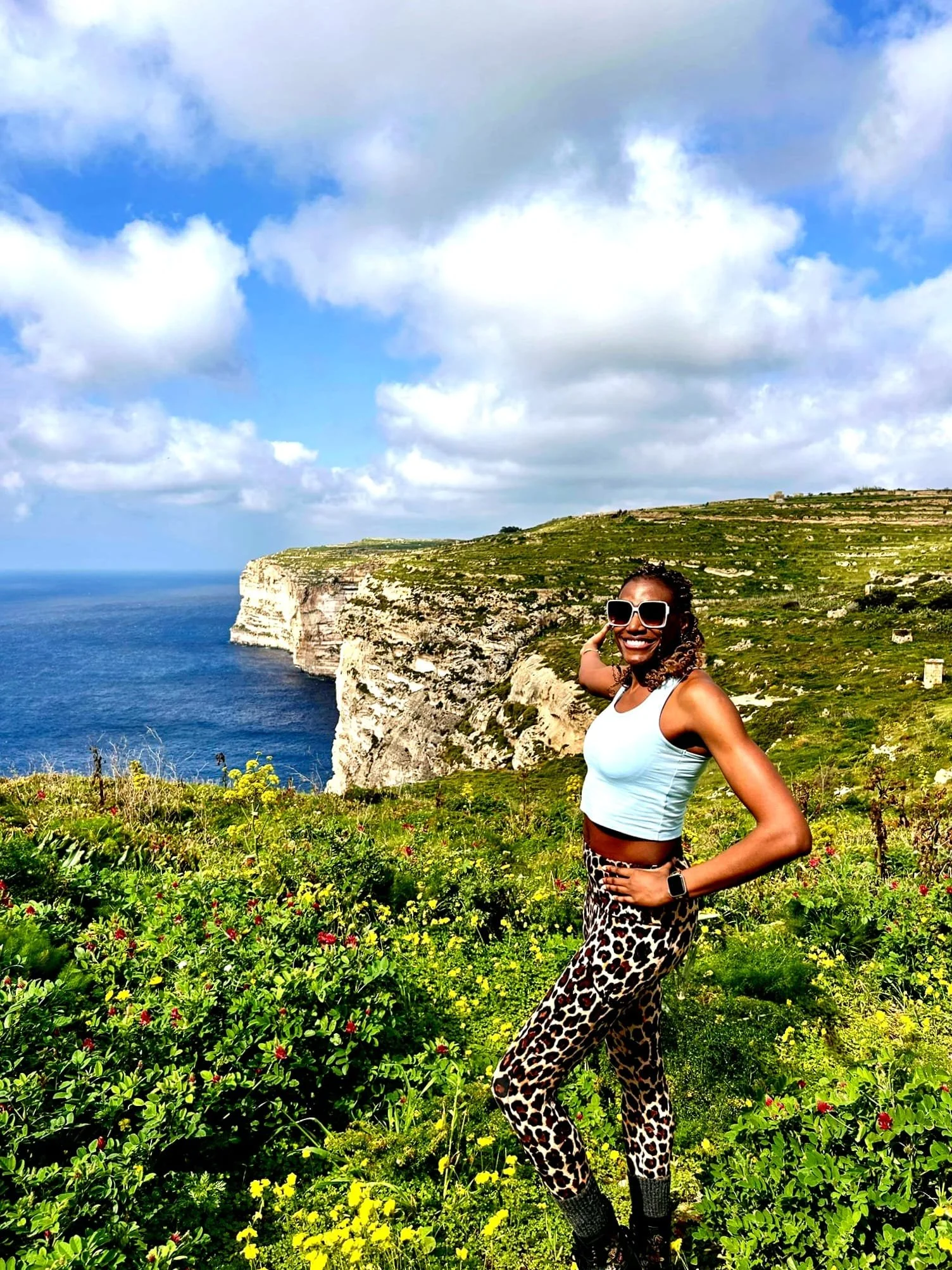 Hiking in Gozo overlooking West Coast Cliffs