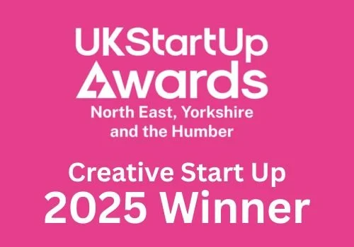 Pink background with white text reading 'UK StartUp Awards, North East, Yorkshire and the Humber, Creative Start Up, 2025 Winner'.