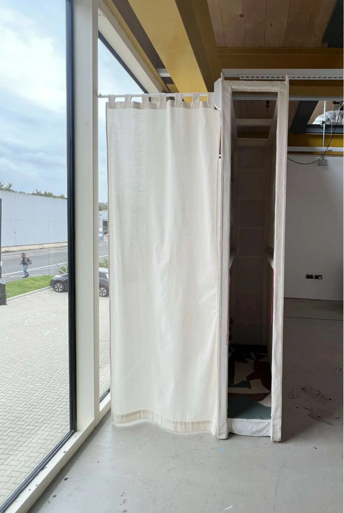 Room 1 (behind the curtain) and The Cave (right)