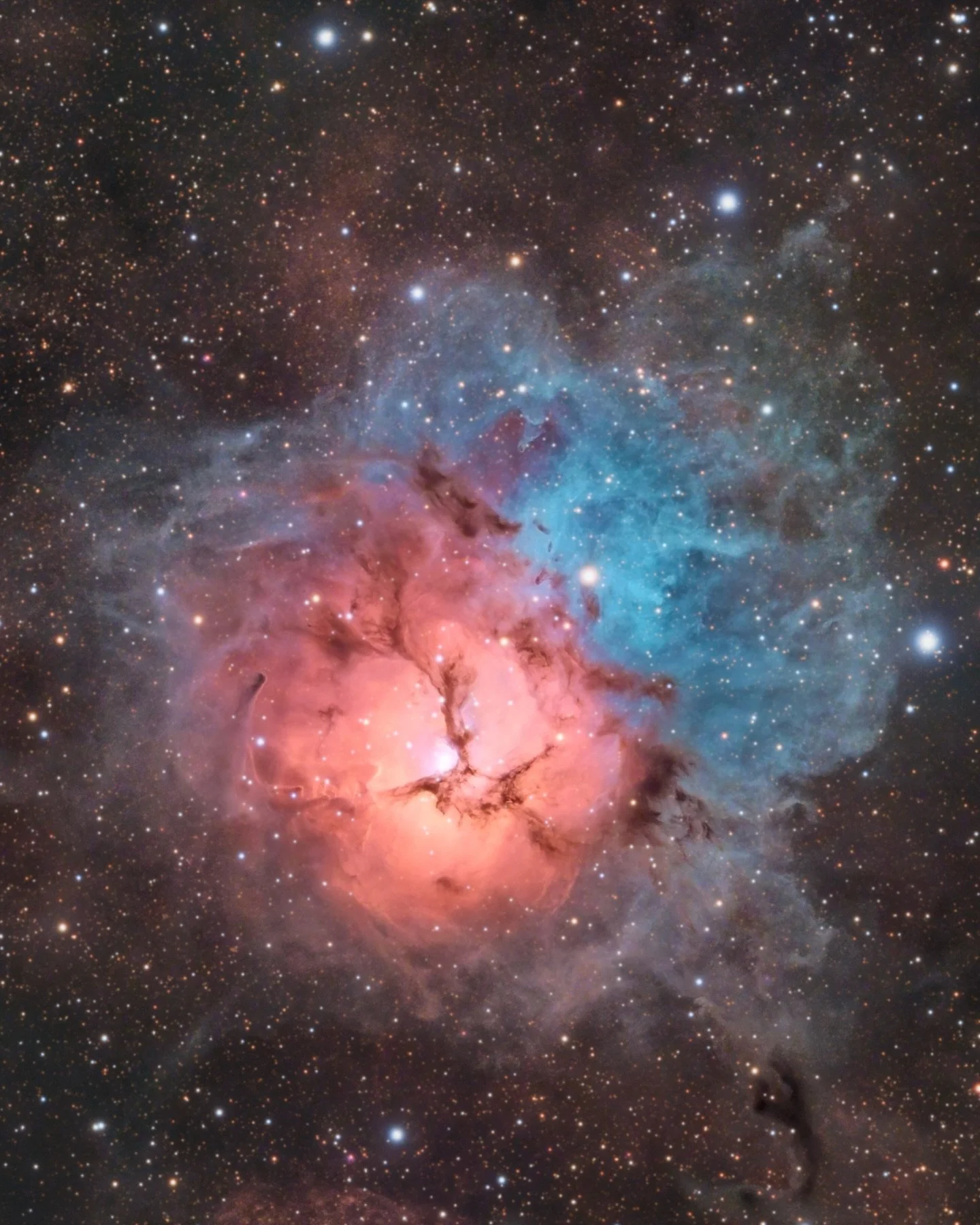 Image by @owleyedstudio
The Trifid Nebula - M20

This image is the first of two projects completed between these events, collecting photons under some of the darkest skies in central Italy.

This LRGB image was processed to preserve the natural appea