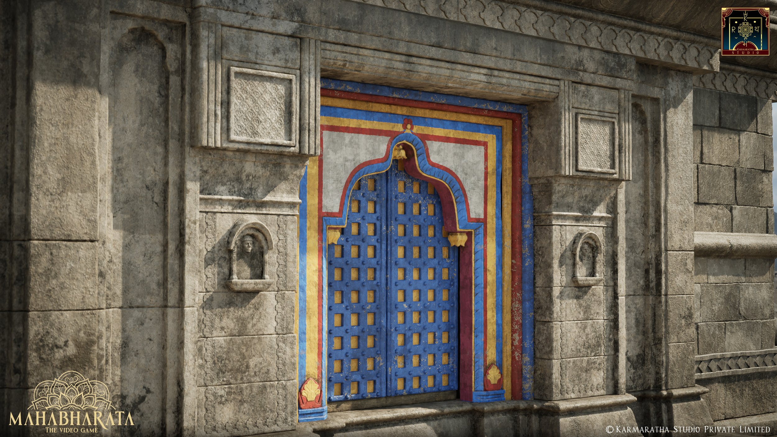 A colorful, ornate door set into a stone wall, decorated with patterns and bright colors, with small carved sculptures on each side.