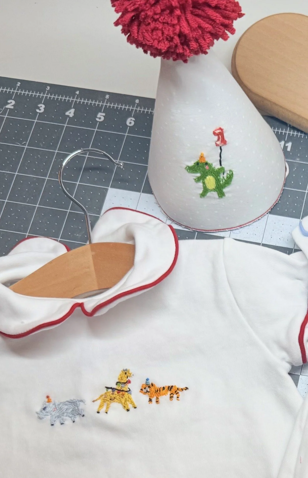 Hand-embroidered children’s collar with colorful motifs.