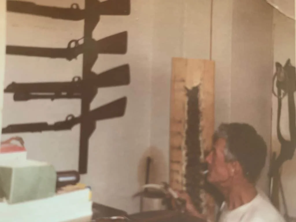 Merv Whitbeck interior with gun rack