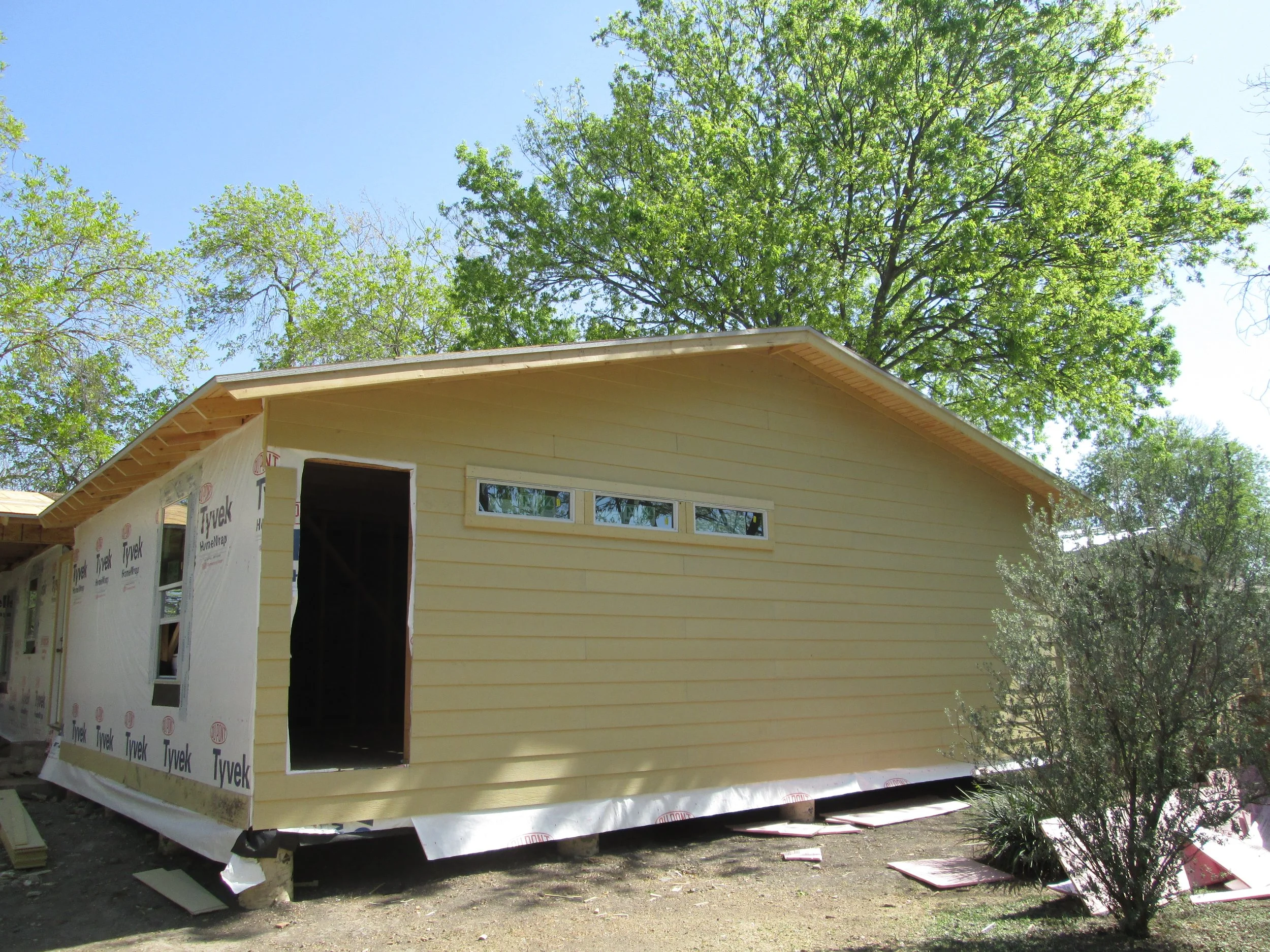 IMG_1531 (3-30-13 starting installing siding at back of house).JPG