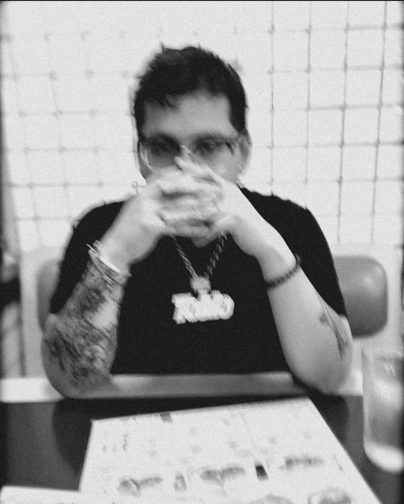 Black-and-white portrait of TOKiO Pete, Dallas-based photographer and videographer