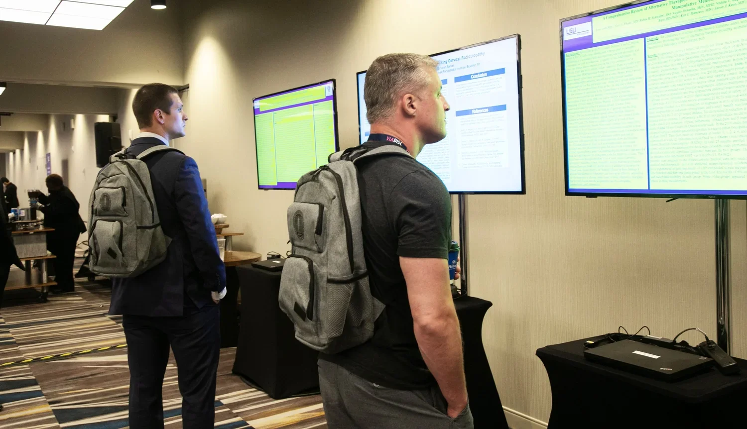 clients with branded backpack