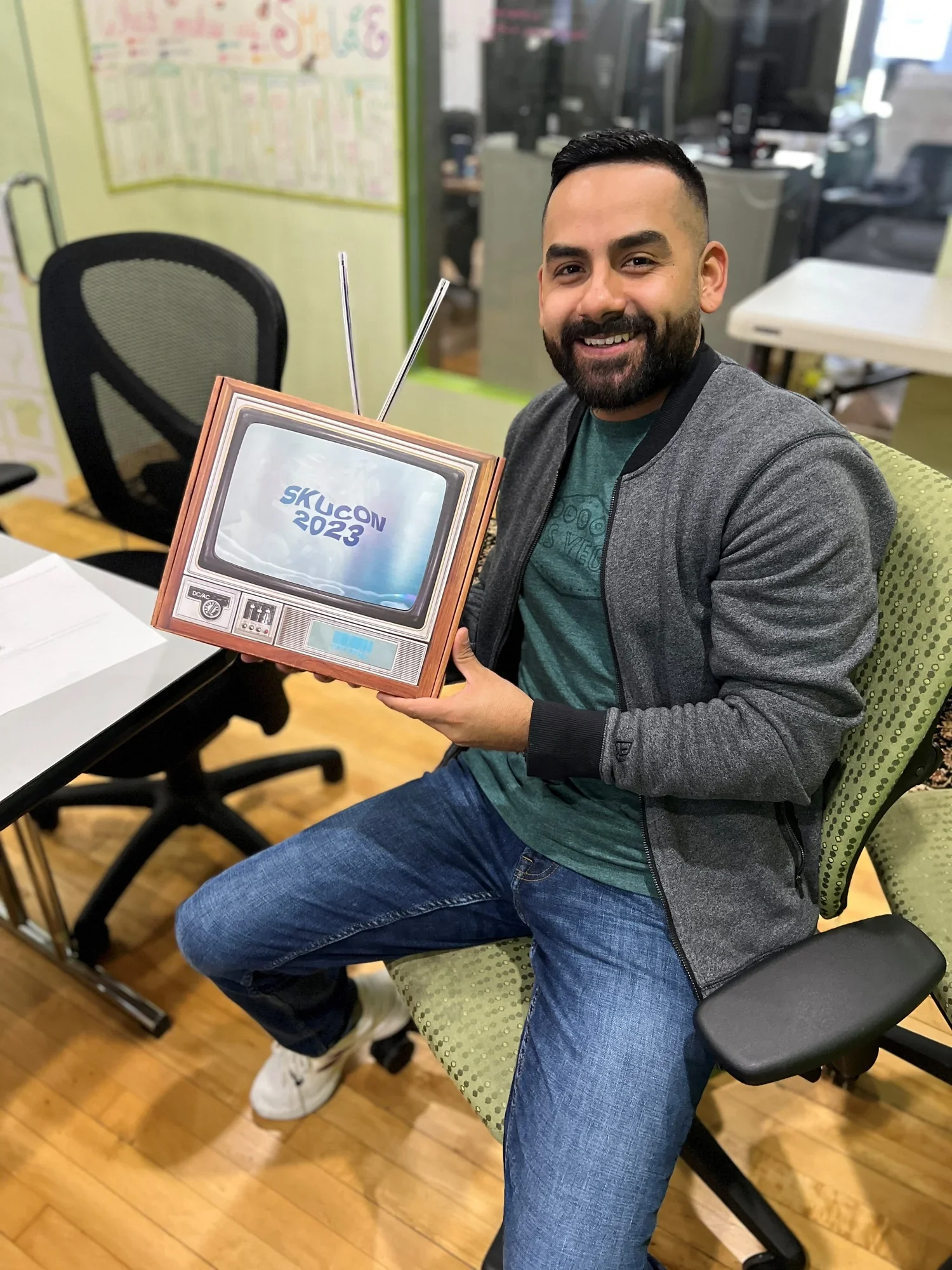 Image of an unboxing experience featuring branded packaging, curated merch items, and sustainable materials, highlighting the rise of packaging as a key part of the gifting moment.