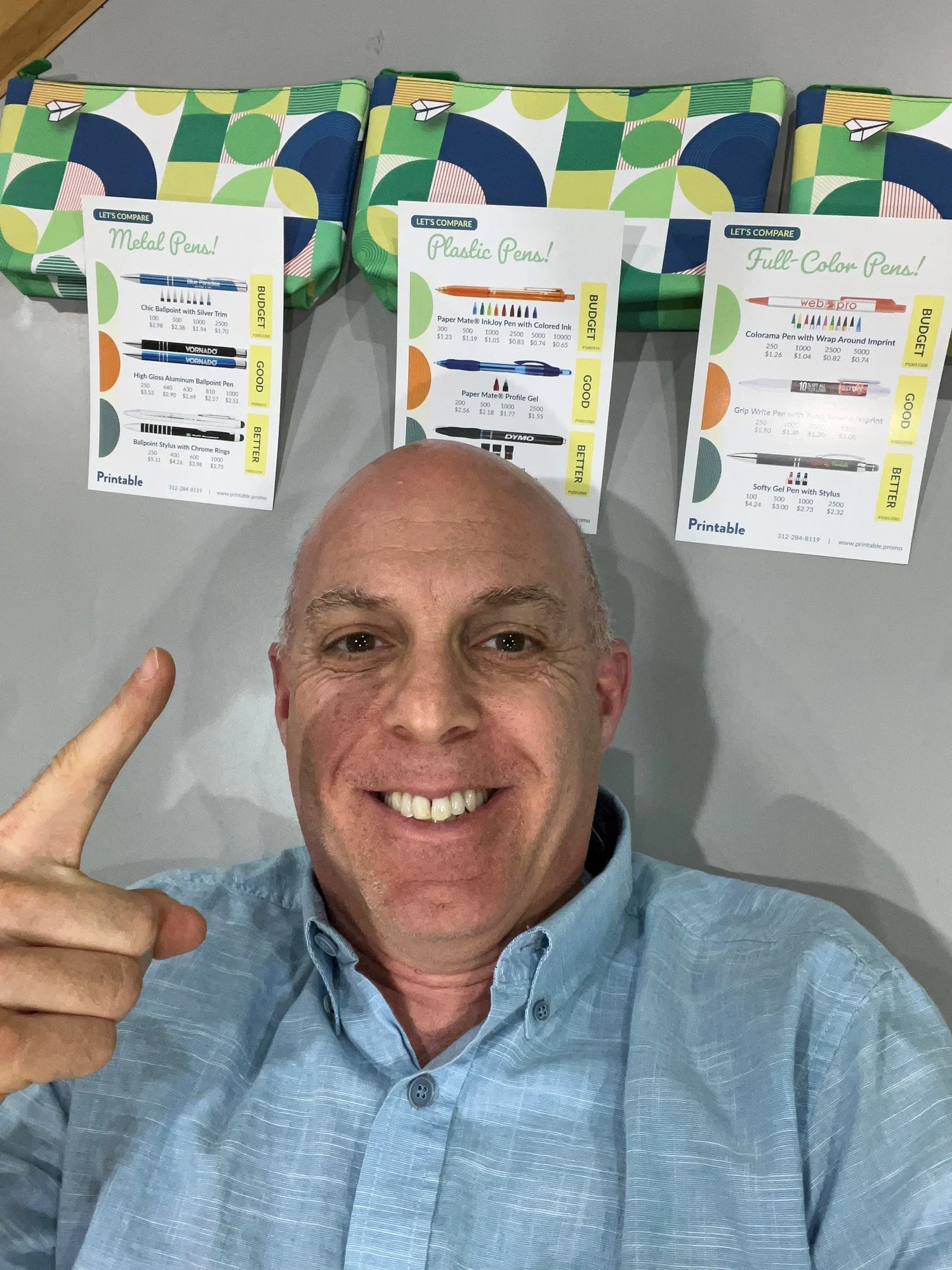 Image of multiple pen styles arranged neatly in a sample kit, illustrating how clients can try different writing options before selecting their preferred branded pen