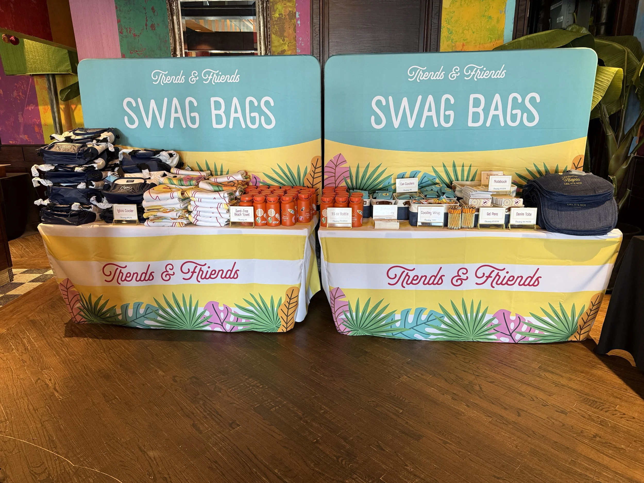 corporate event giveaway merch table display