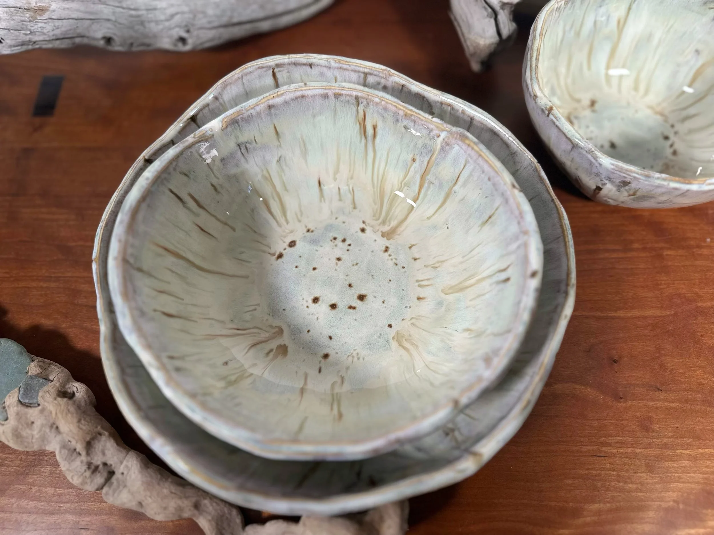 top view shoing the medium bowl inside the larger bowl set 1 of 3 nesting bowls by yellowstoneware by jessy fale - 2026 Aspen Bark Colletion.jpg