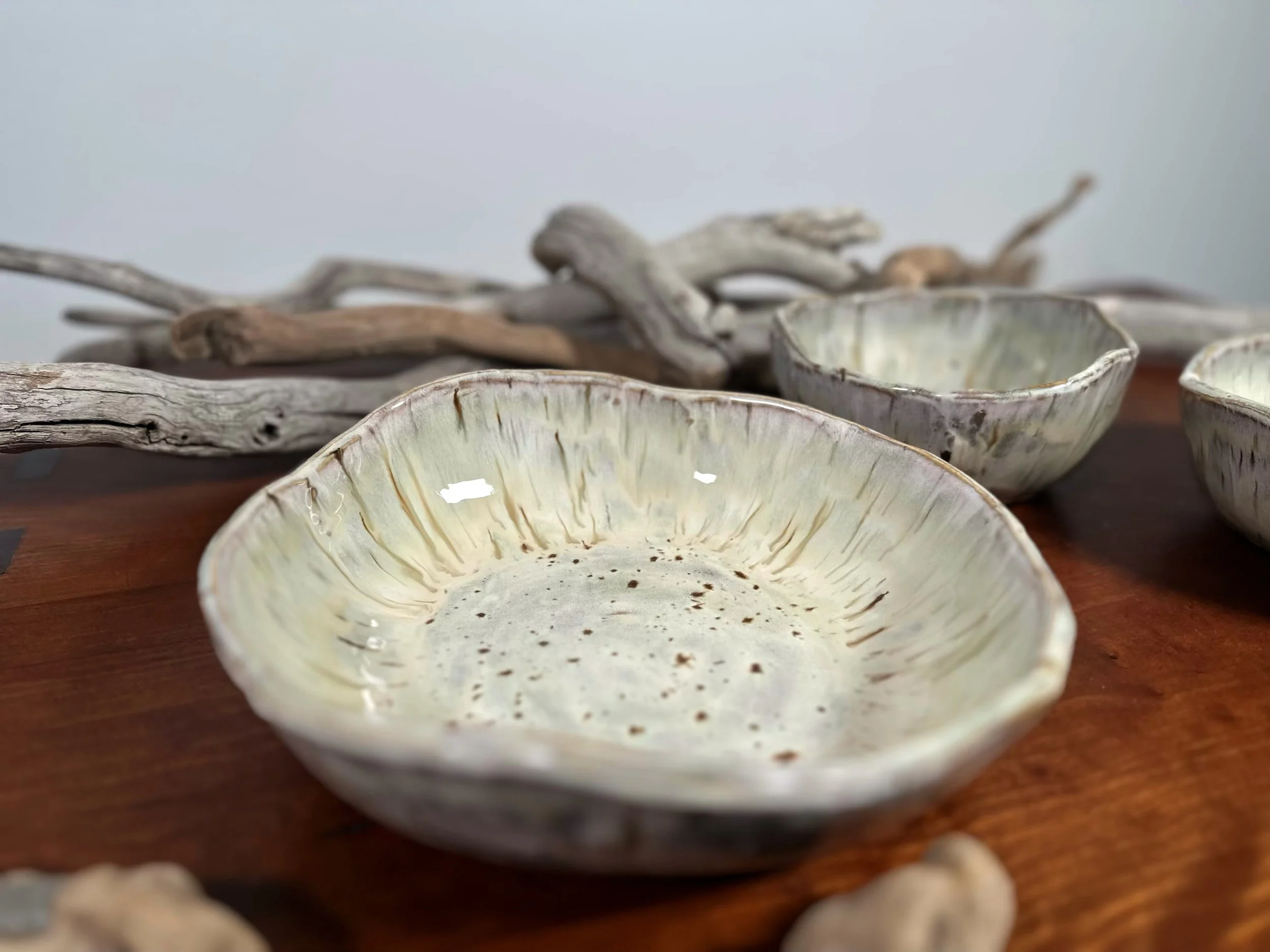 set 1 of 3 nesting bowls 2026 aspen bark collection by yellowstoneware by jesse fales showing side view of the  large bowl from 3 bowls copy.jpg