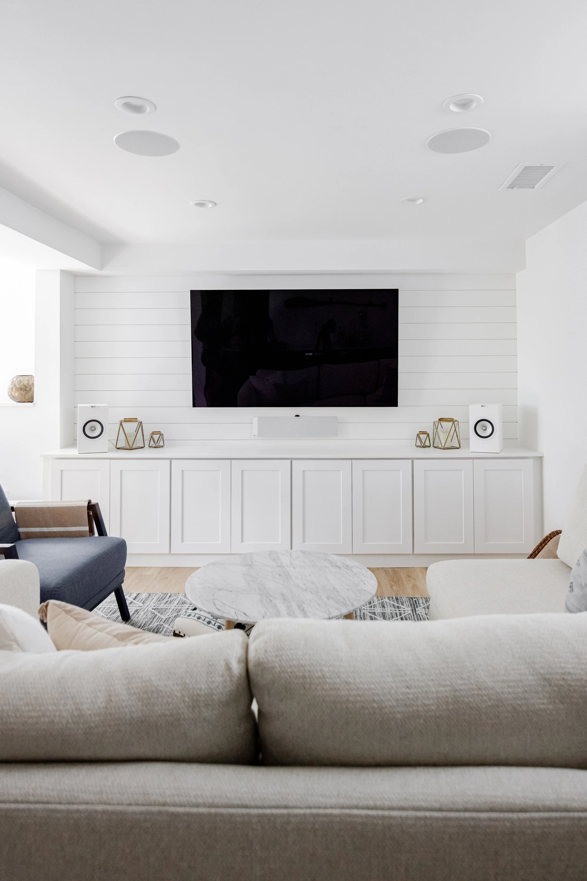 Bright white basement in Minneapolis remodel