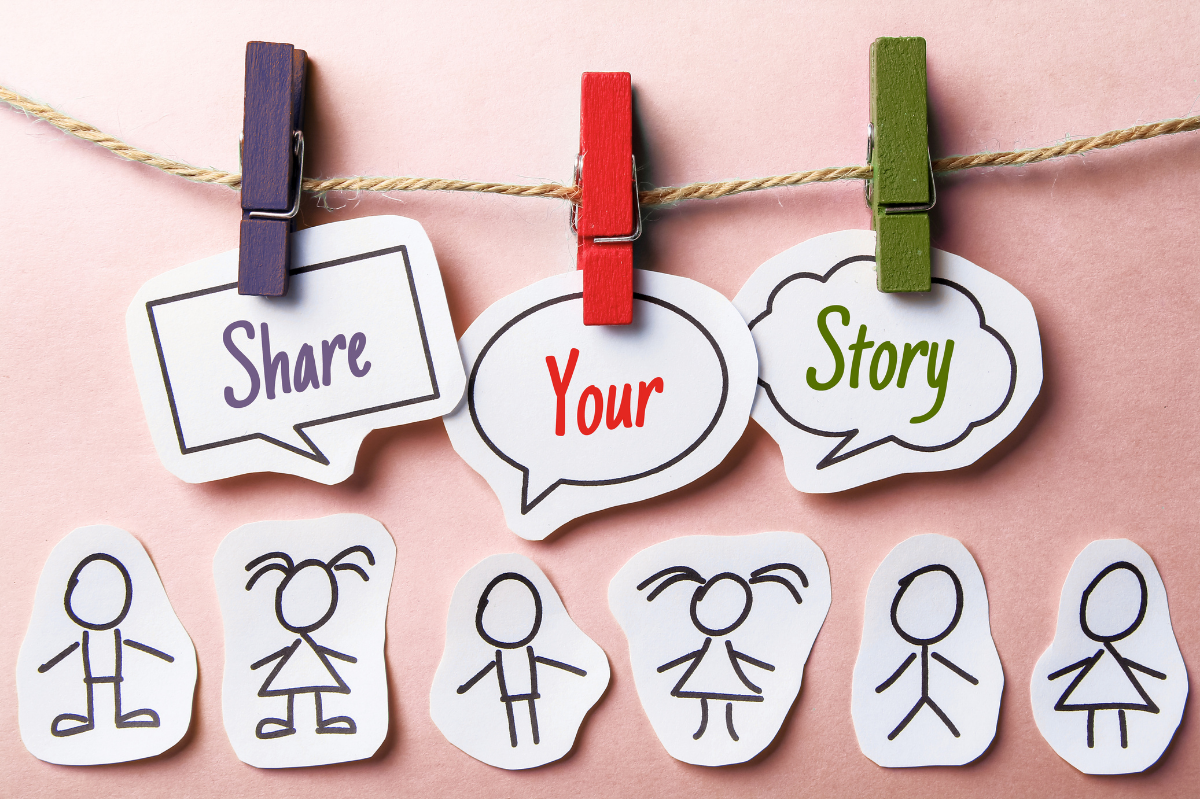 Colorful clothespins holding paper speech bubbles that say 'Share Your Story' against a pink background, with paper cutouts of simple stick figure children below.