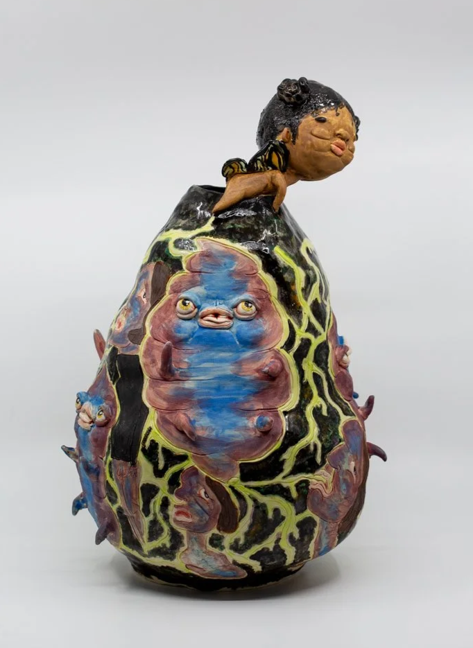 A Parasite Named Stone        
Porcelain and amaco underglazes
Mid-range Cone 6 (1220°C) 
Coil built 
44 x 33 x 27 cm
2026 
