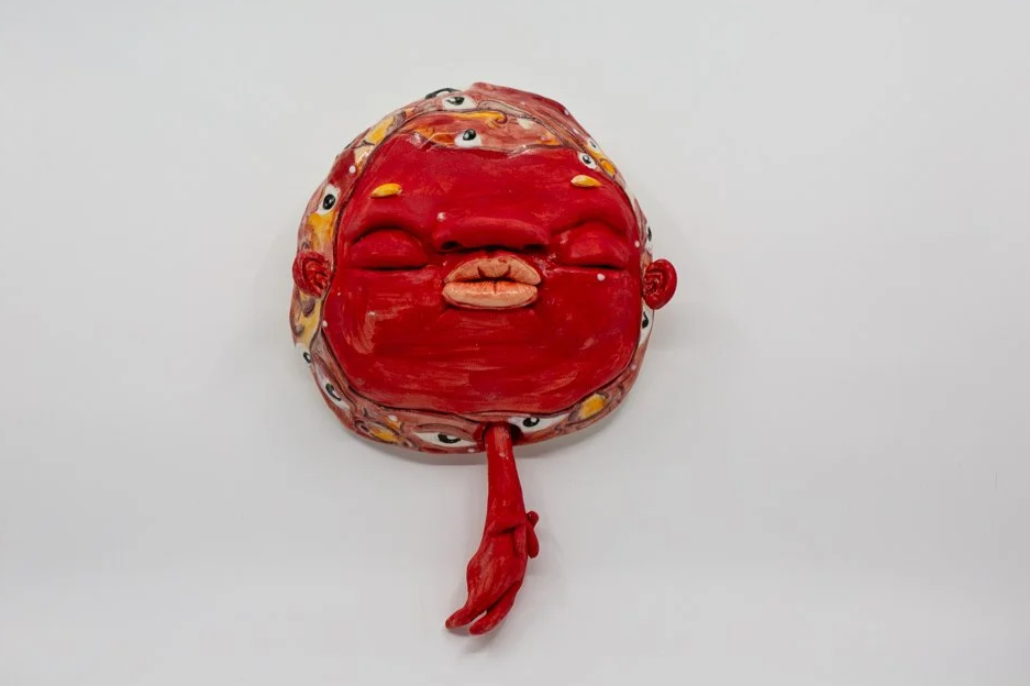 Red Floating Head
Porcelain and amaco underglazes
Mid-range Cone 6 (1220°C) 
Slab built 
24 x 15 x 6 cm 
2026 