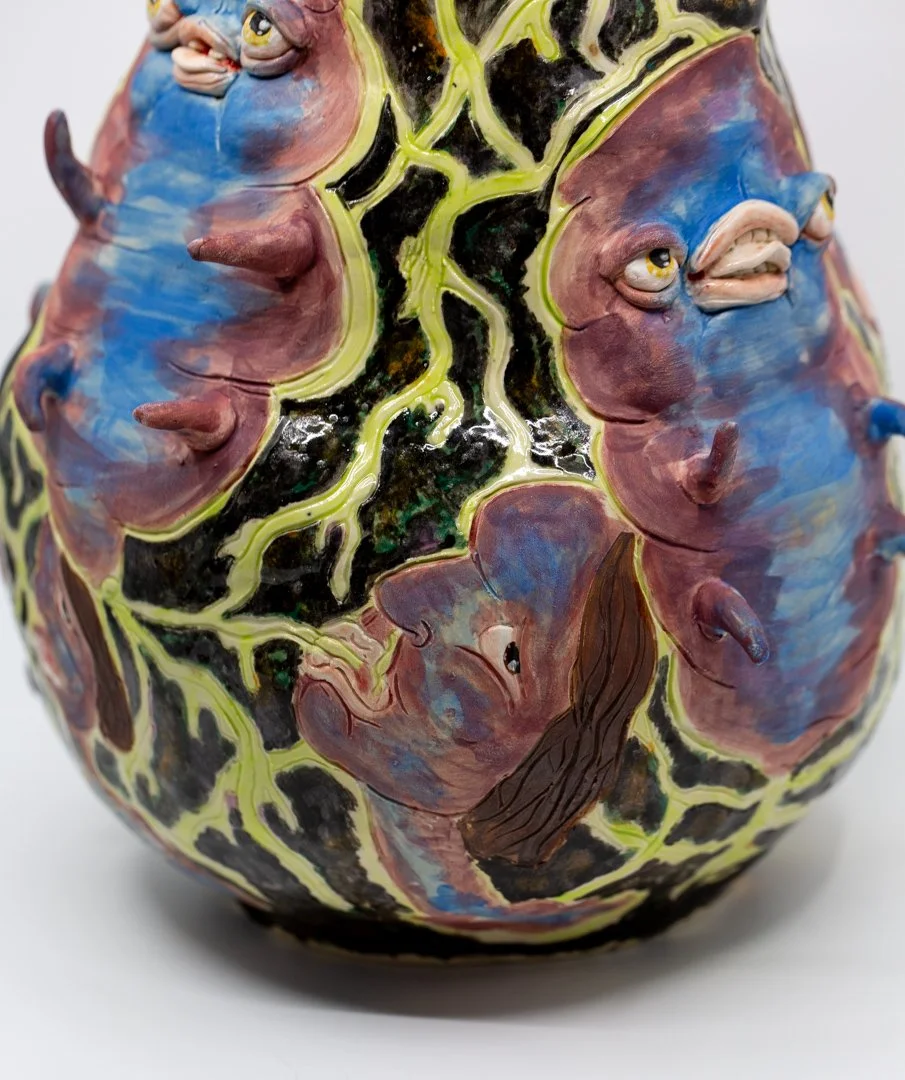 A Parasite Named Stone        
Porcelain and amaco underglazes
Mid-range Cone 6 (1220°C) 
Coil built 
44 x 33 x 27 cm
2026 