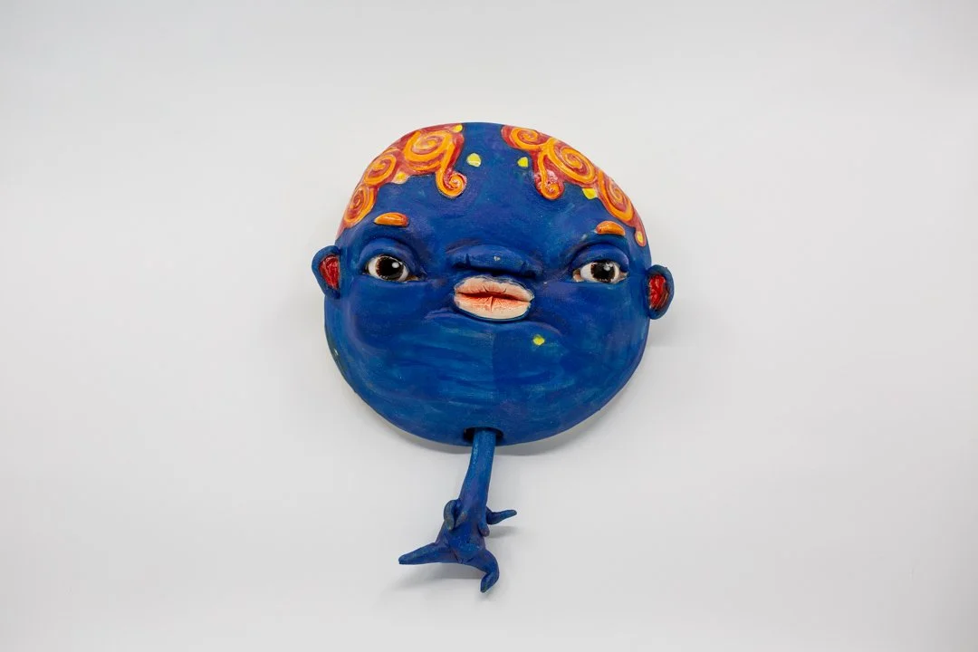 Blue Floating Head
Porcelain and amaco underglazes
Mid-range Cone 6 (1220°C) 
Slab built 
24 x 15 x 7 cm 
2026 