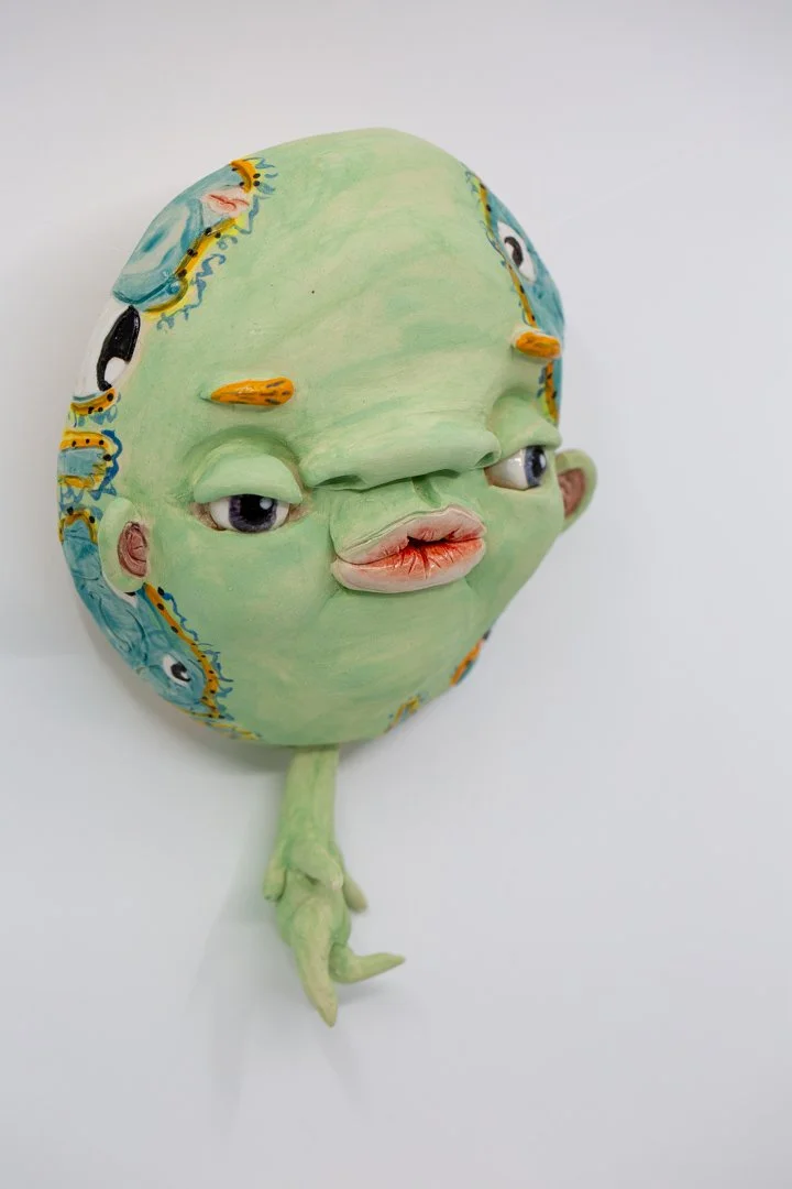 Mint Floating Head
Porcelain and amaco underglazes
Mid-range Cone 6 (1220°C) 
Slab built 
24 x 15 x 6 cm 
2026 