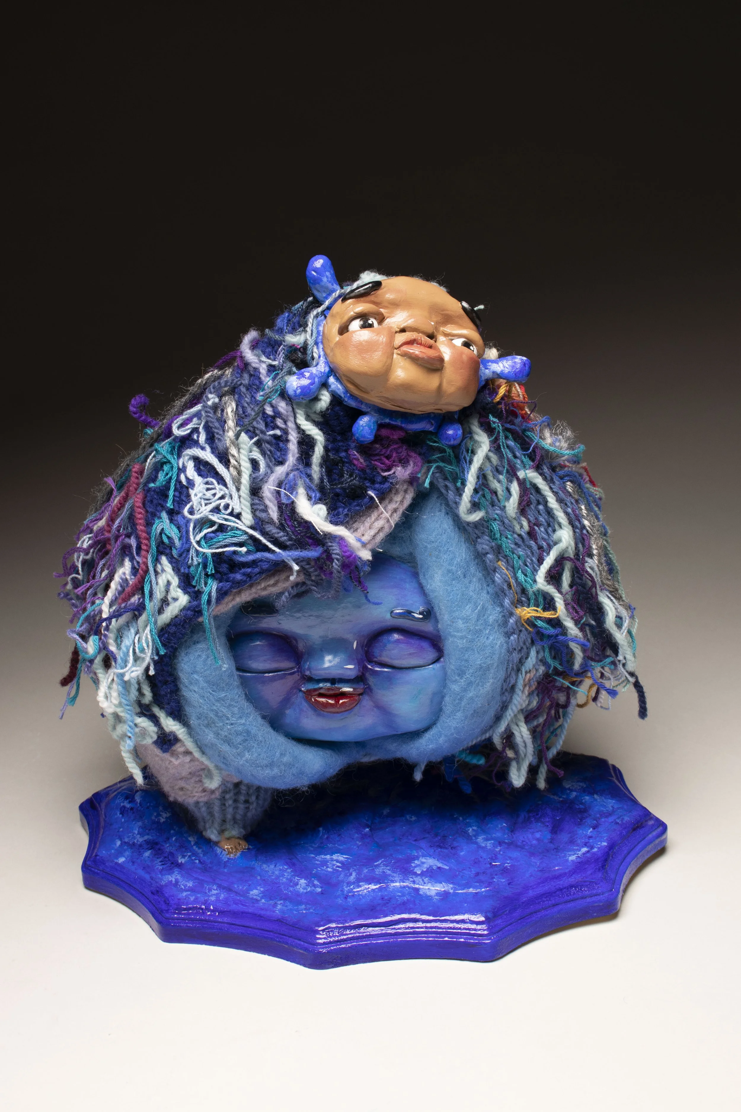 Sad Blue.

Polymer clay, wire, yarn, on wood 
31 x 28 x 18 cm
2023