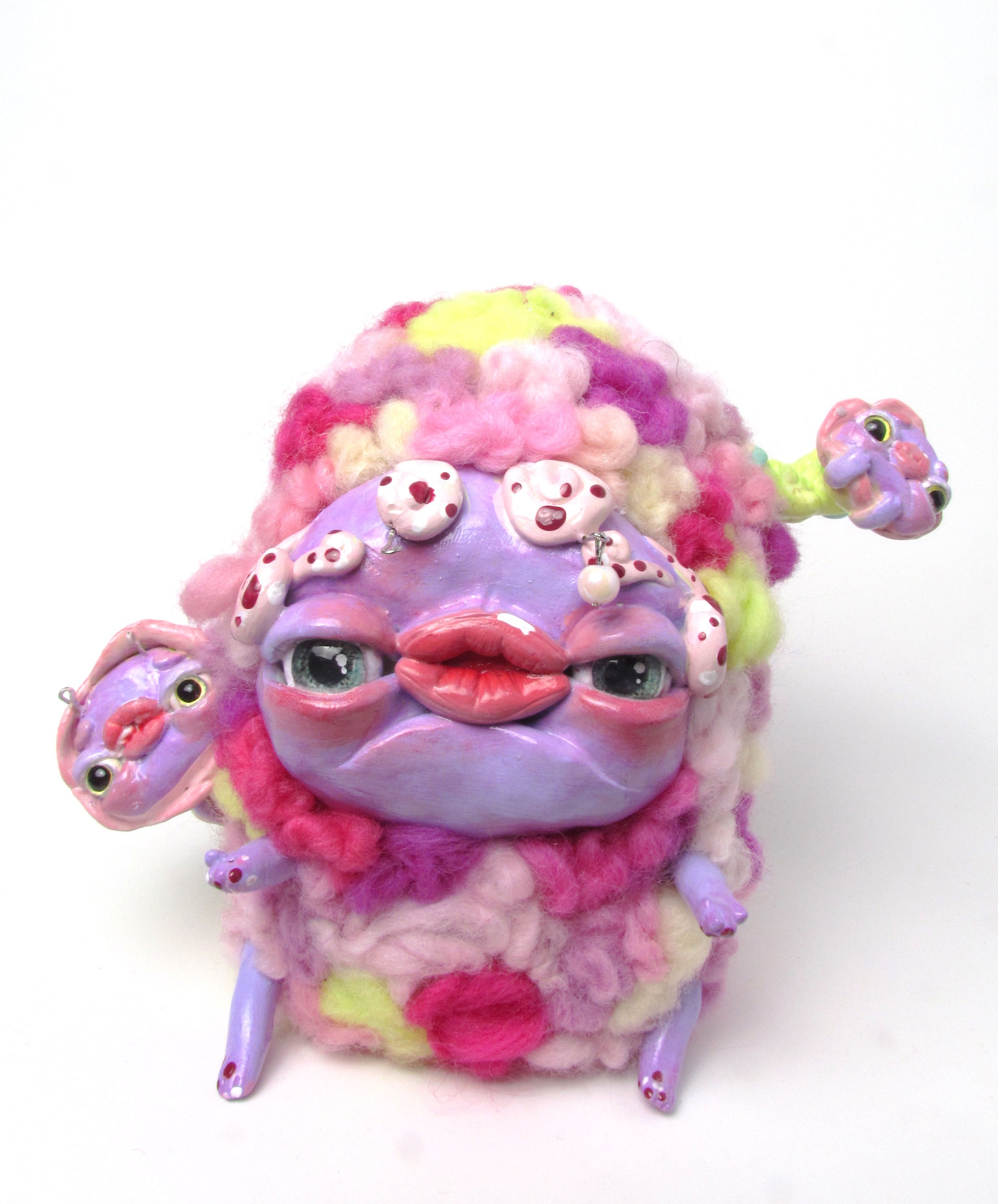 Pink Pal.

Polymer clay, dyed wool, wire, beads, acrylic paint 
15 x 17 x 11 cm
2024