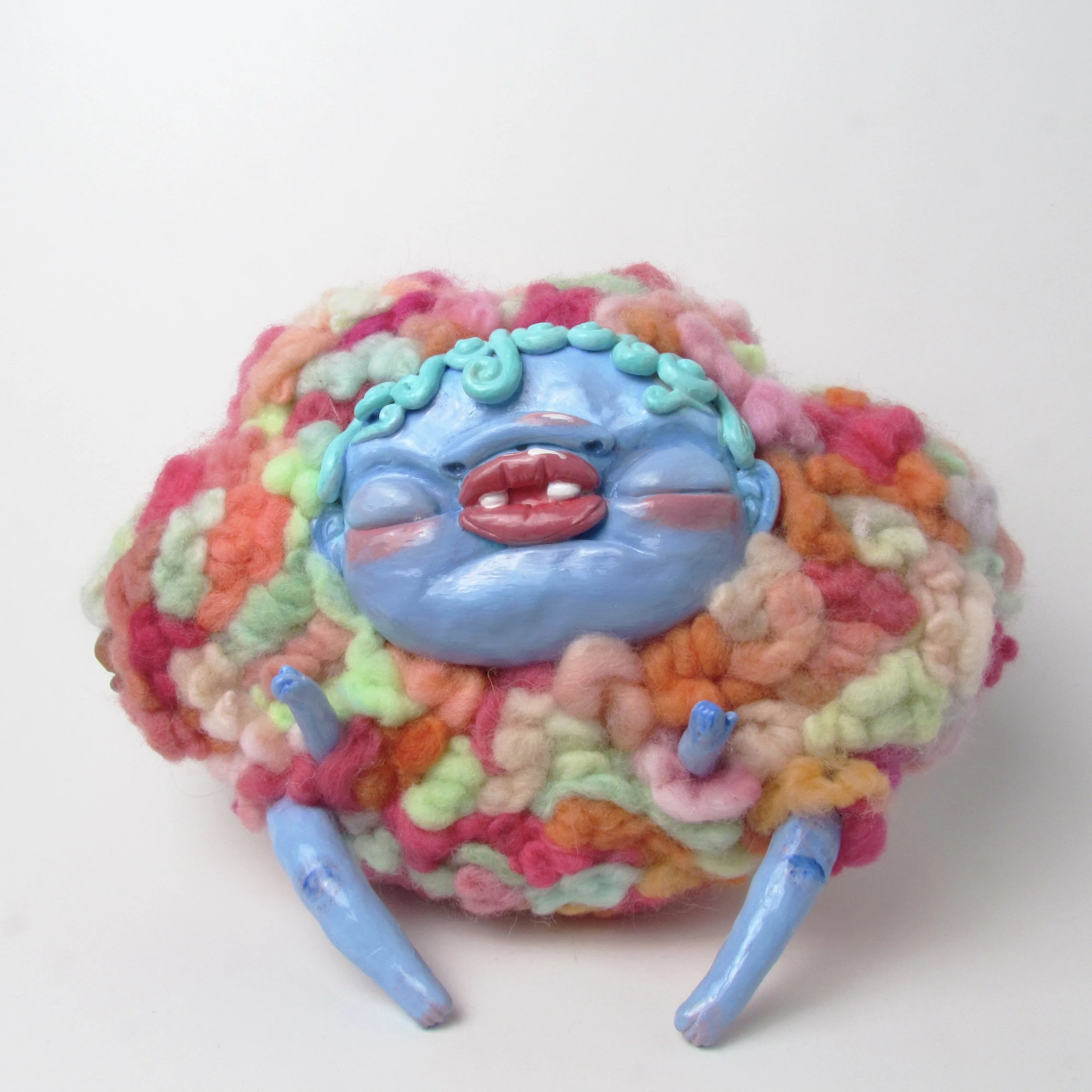 Blue Monster and Three Heads.

Polymer clay, dyed wool, acrylic paint, wire 
15 x 22 x 11 cm 
2024