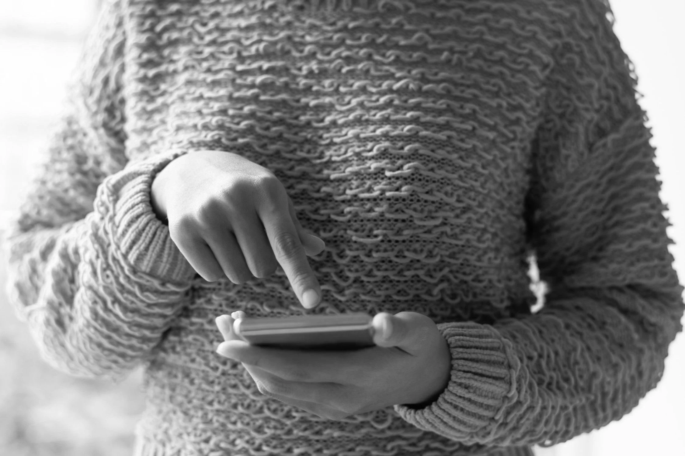 Close-up image of an adult female using her phone to contact LifewRx Mental Health and Wellness, located in Columbus and Middleburg Heights, Ohio