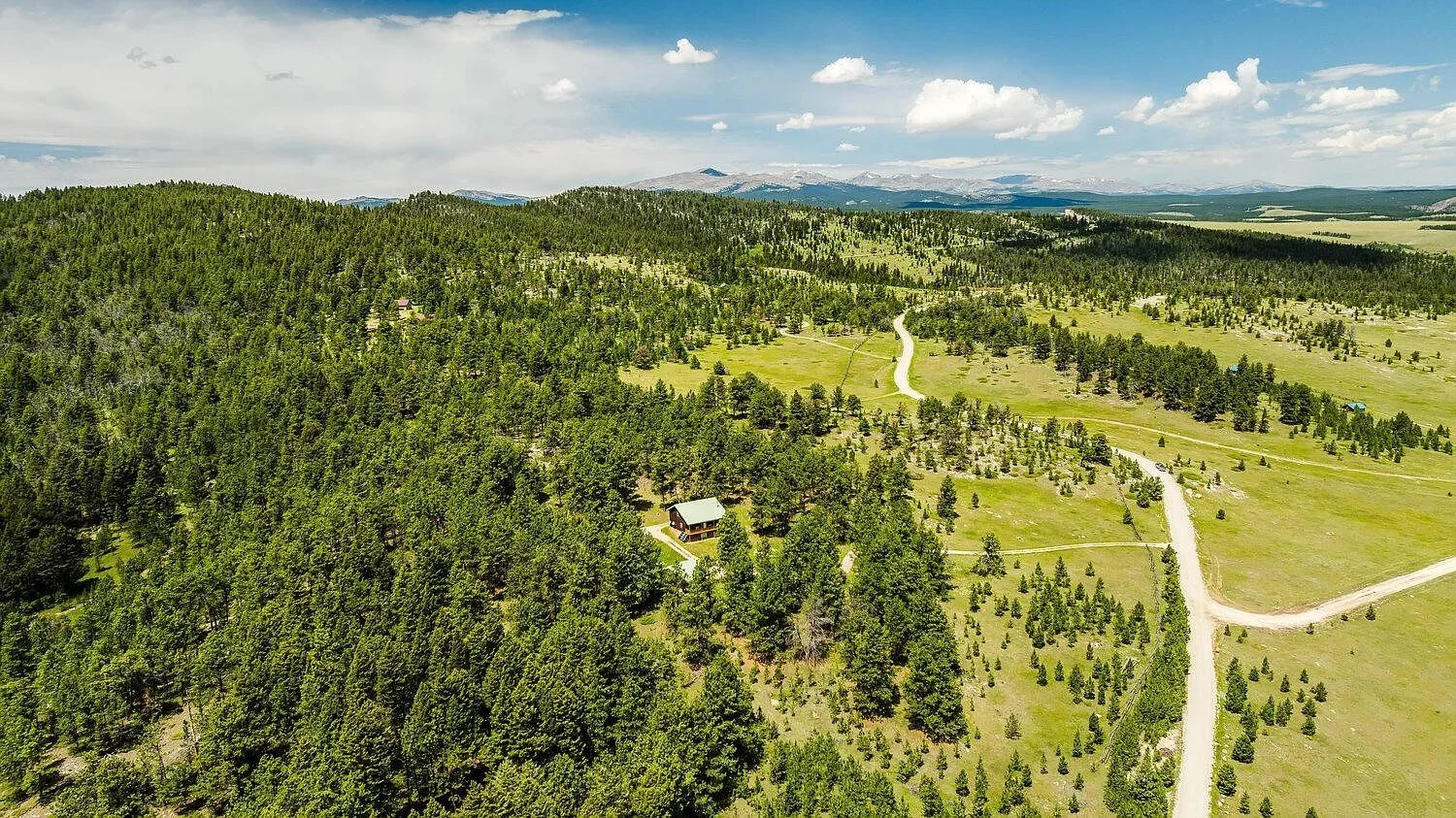 Off-Grid Wyoming Cabin for Sale: 11 Secluded Acres in the Bighorn Mountains