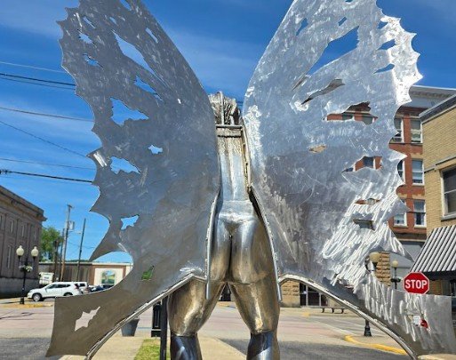 Mothman's buns of steel....literally.