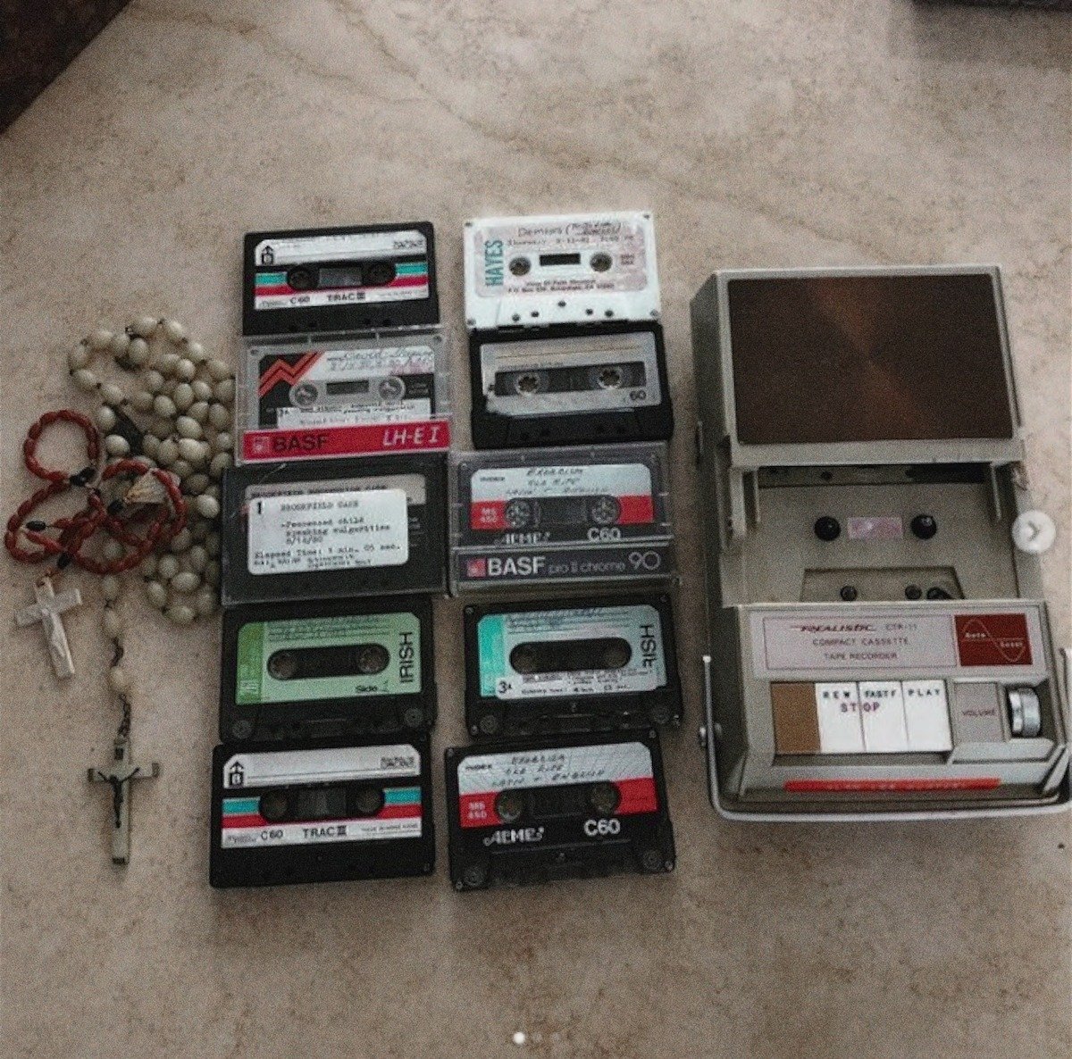 Tape recorder with recordings and rosaries used during David's episodes. - Netflix