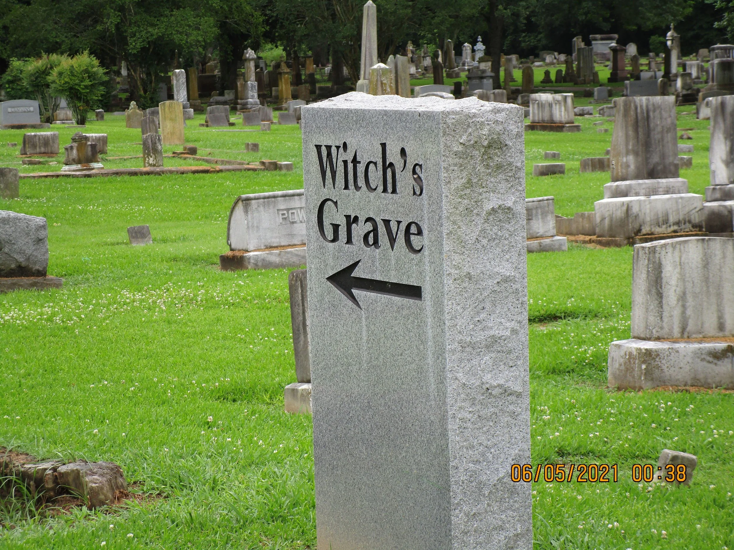 Stone leading visitors to the witch's grave.