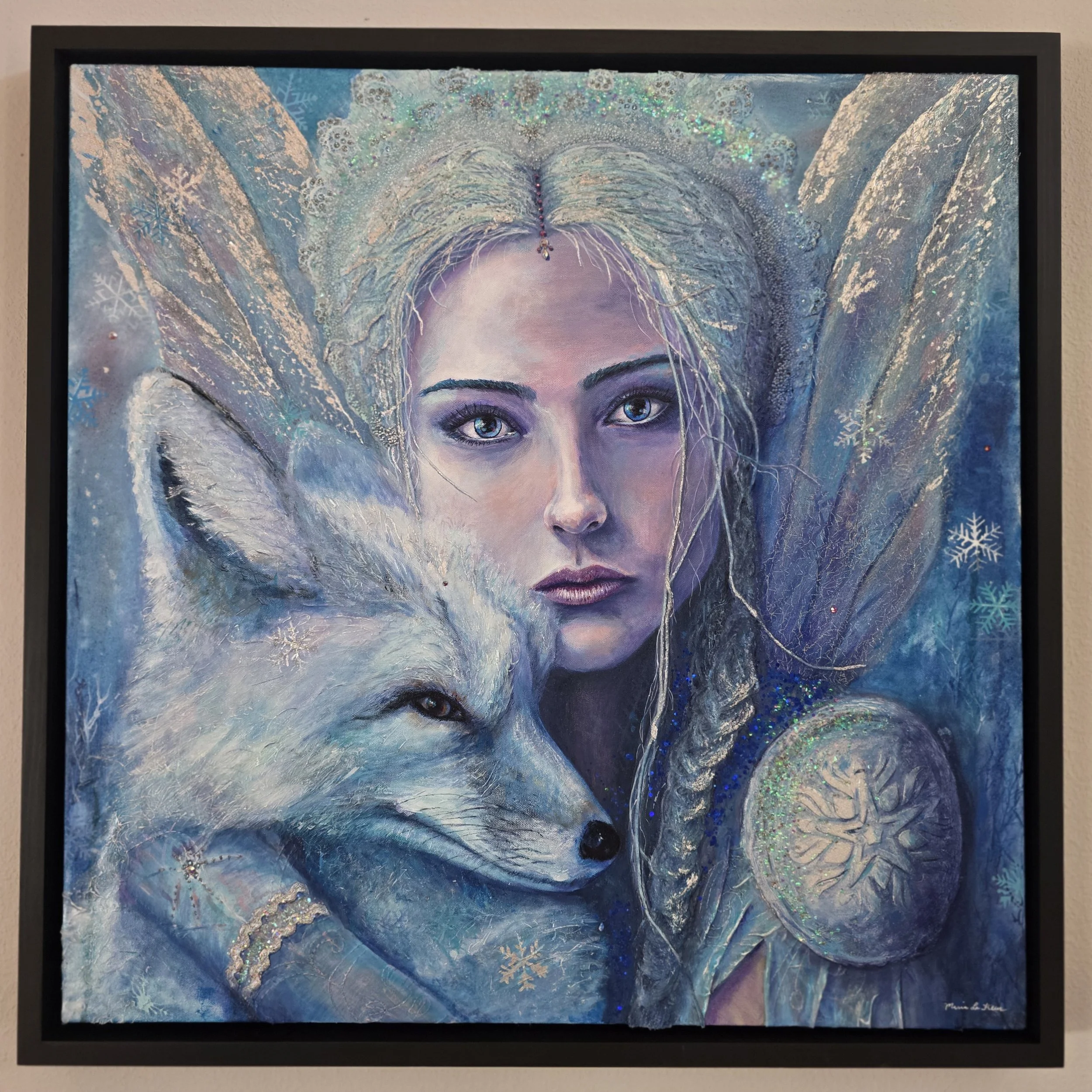 Silver and blue fairy embracing a fox. Winter highlights.