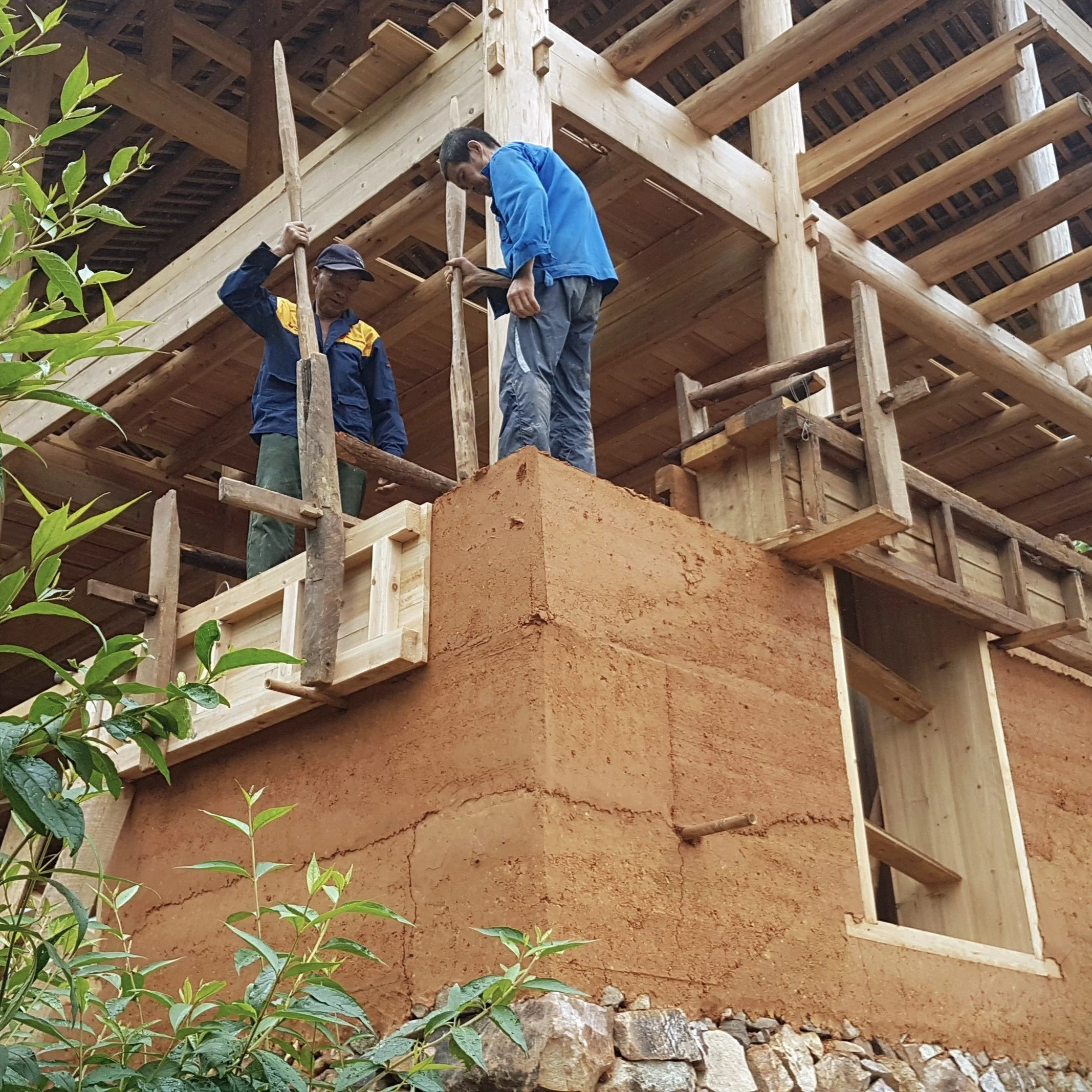 Hand rammed earth