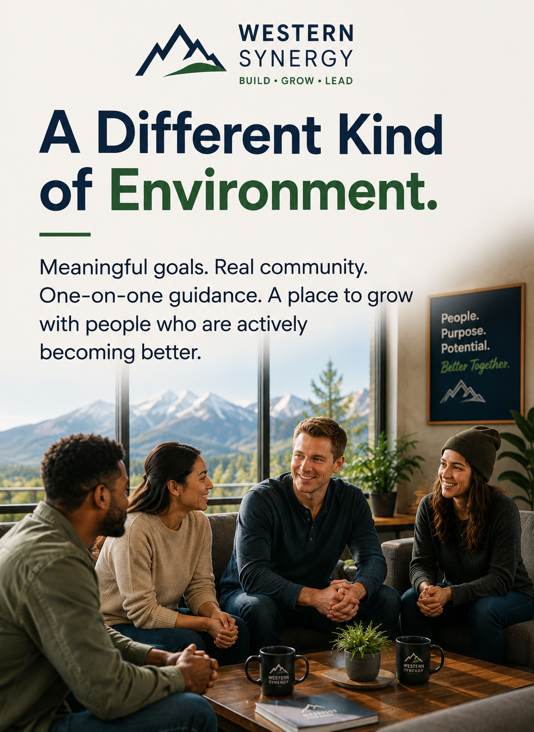 A group of four diverse people sitting in a room with large windows showing mountains in the background. They are smiling and engaged in conversation. There are mugs, a plant, and a notebook on the table. A framed sign on the wall reads, 'People. Purpose. Potential. Better Together.'