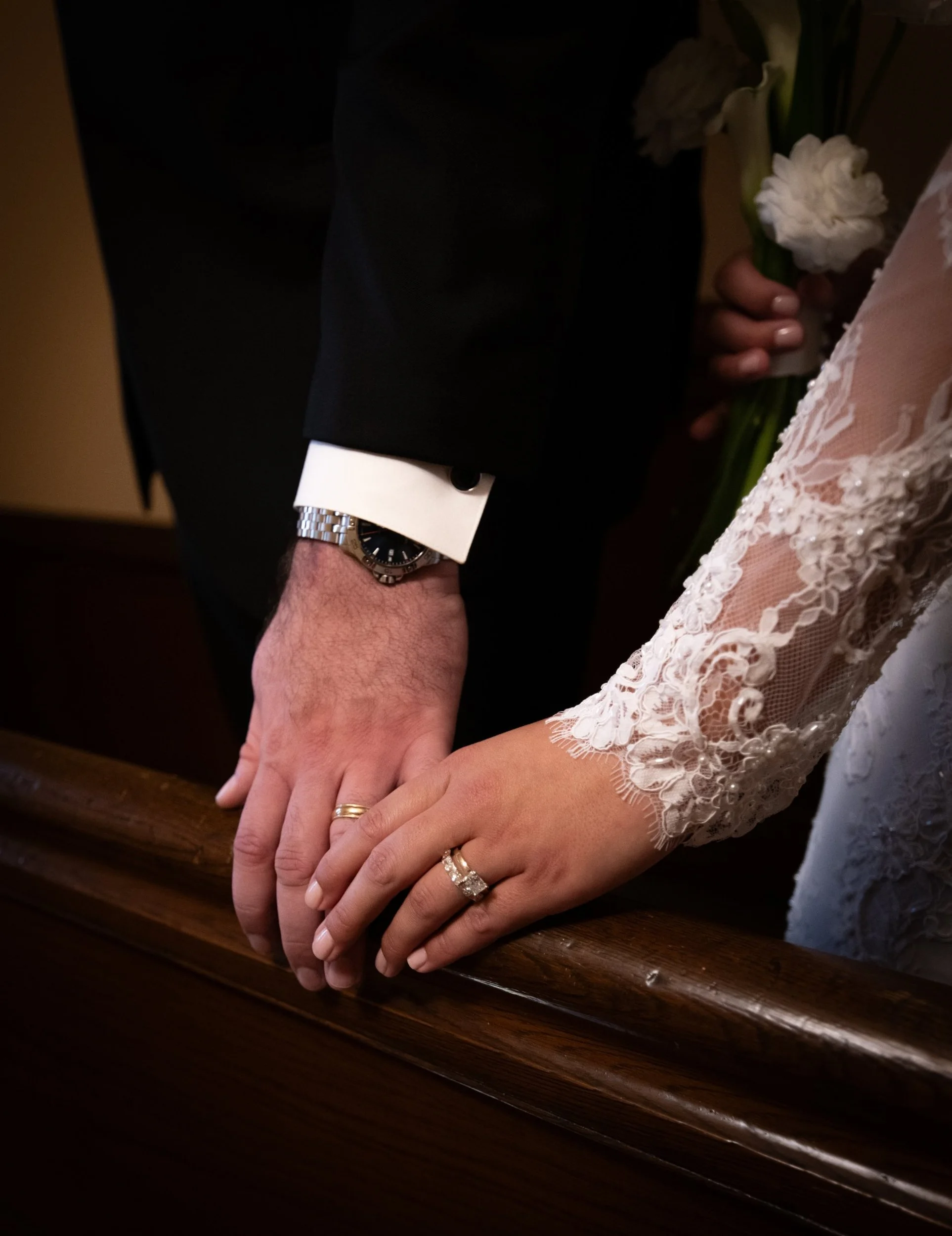 Weddings - Getting ready 3 - holding hands rings detail.jpg