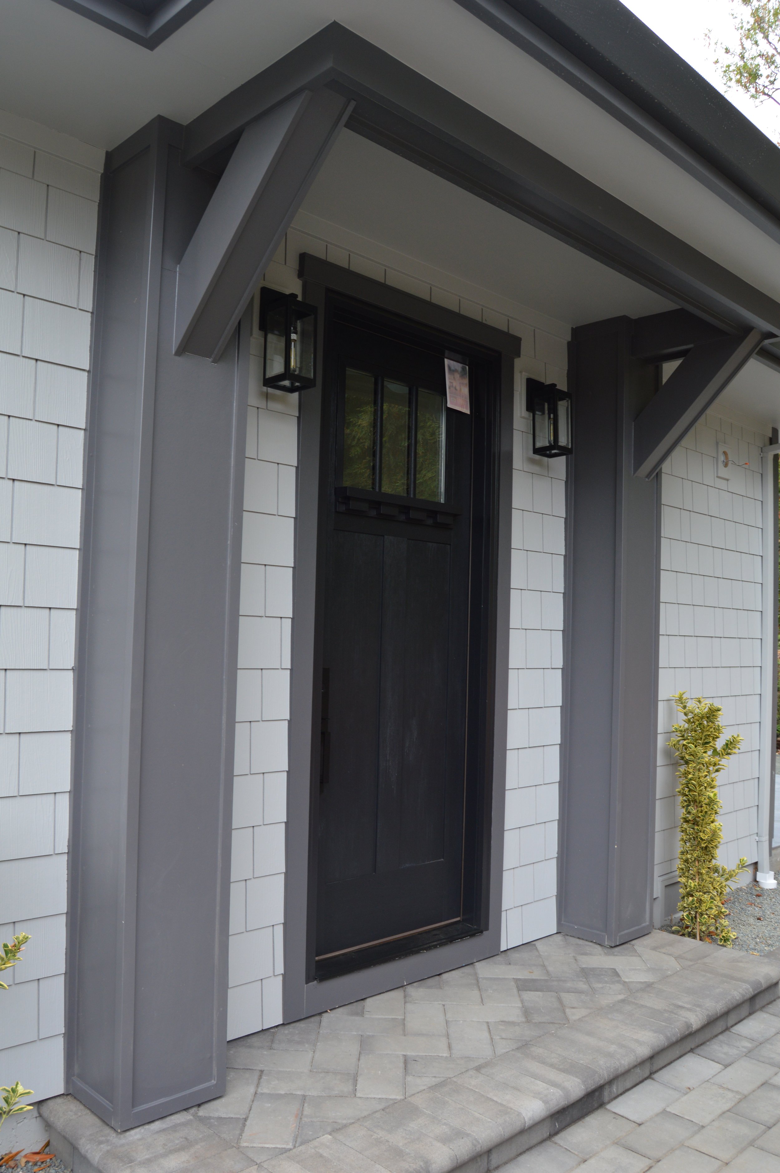 Exterior door, siding, and columns 
